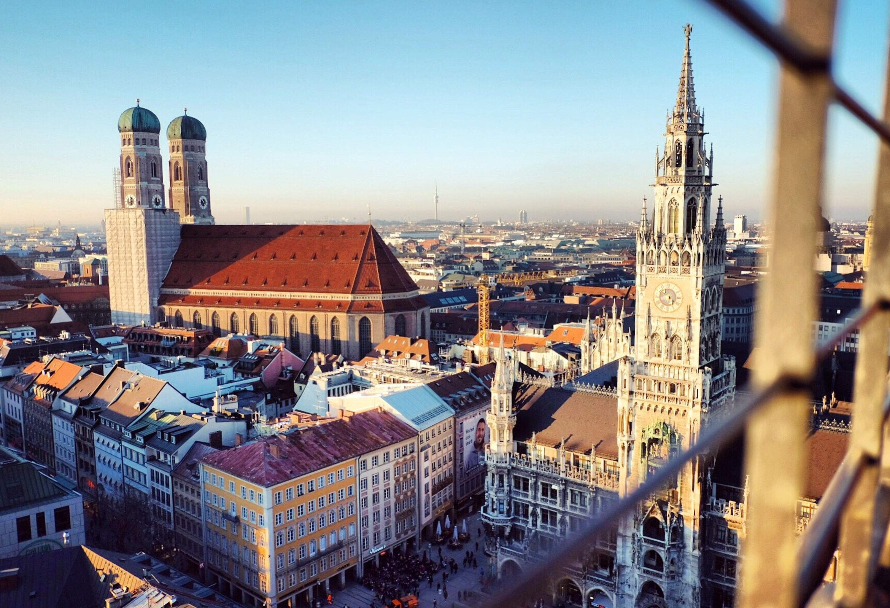 The cathedral with two front domes stands out among the beautiful cityscape.