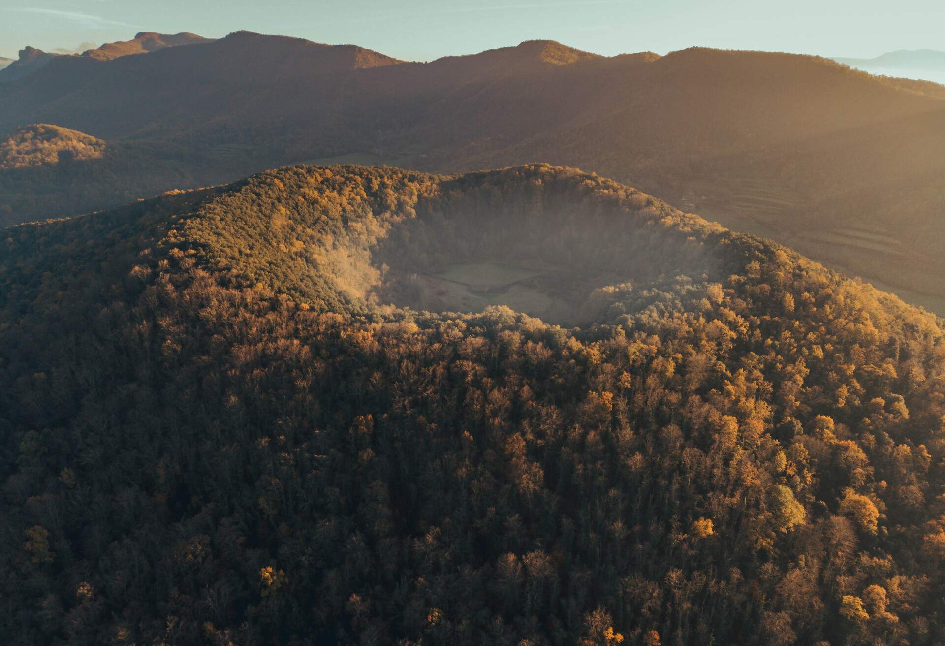 Santa Margarida volcano grater in the volcanic region of La Garrotxa with small chapel inside.