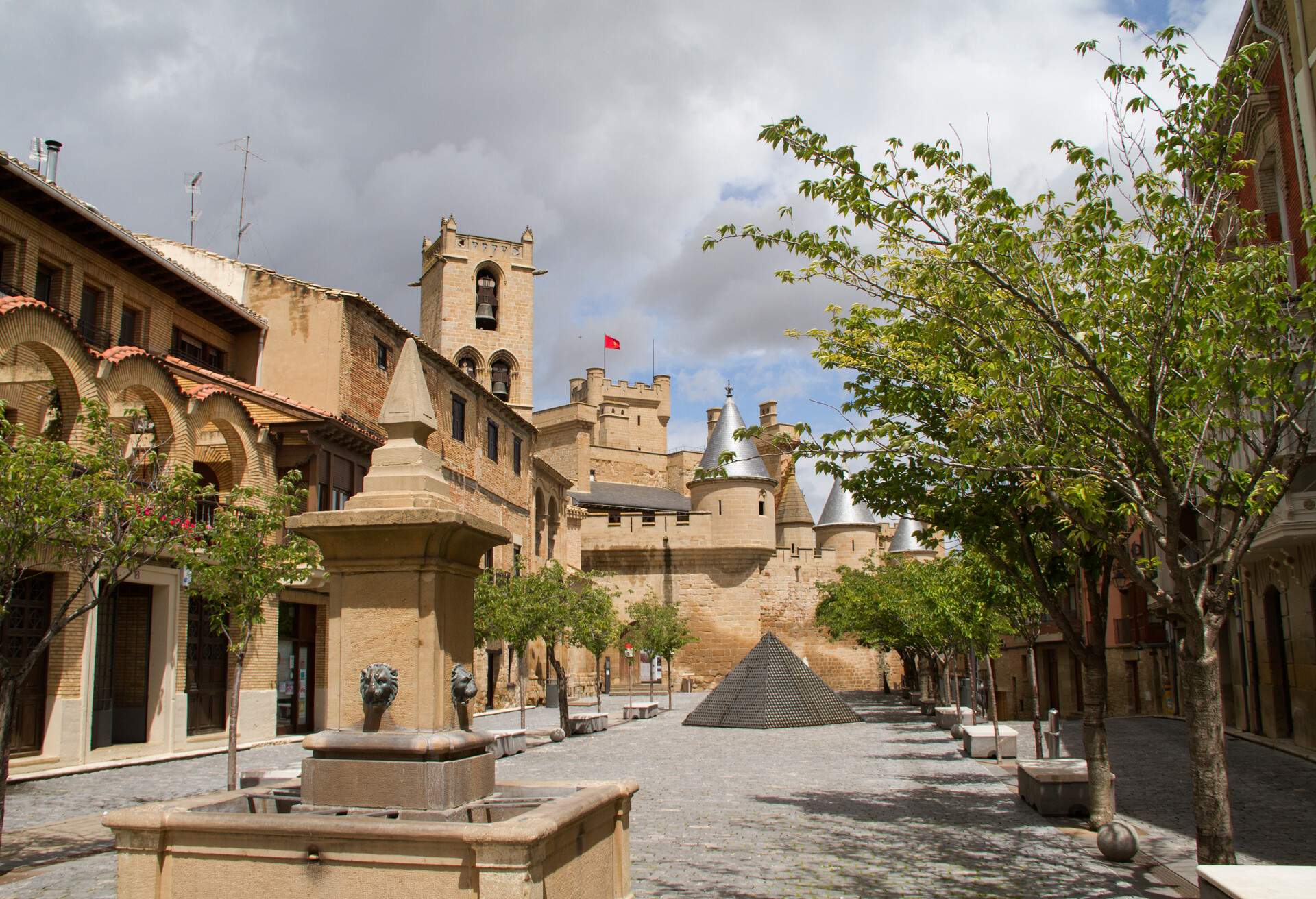 Plaza of Carlos III with the Royal Palace in the background Olite,Spain