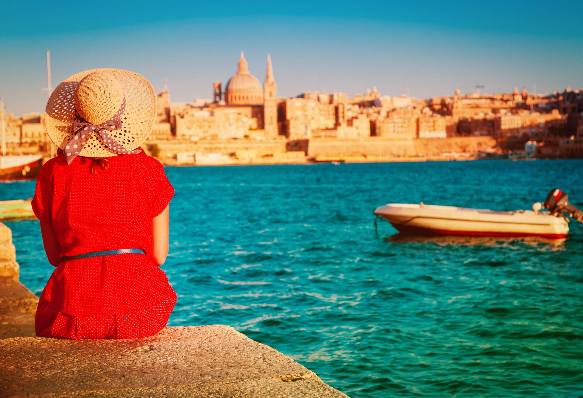 tourist looking at Malta capital in evening, travel concept