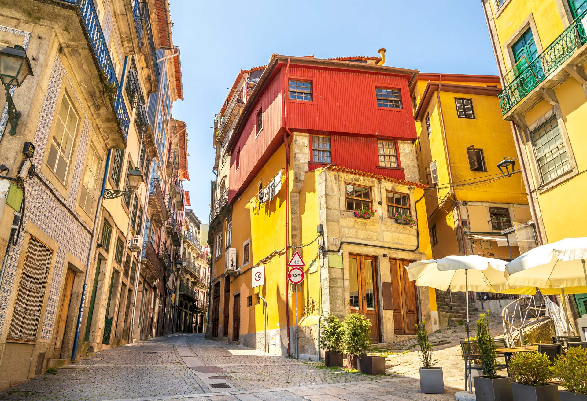 DEST_PORTUGAL_PORTO_RIBEIRA_STREET_GettyImages-1331439165