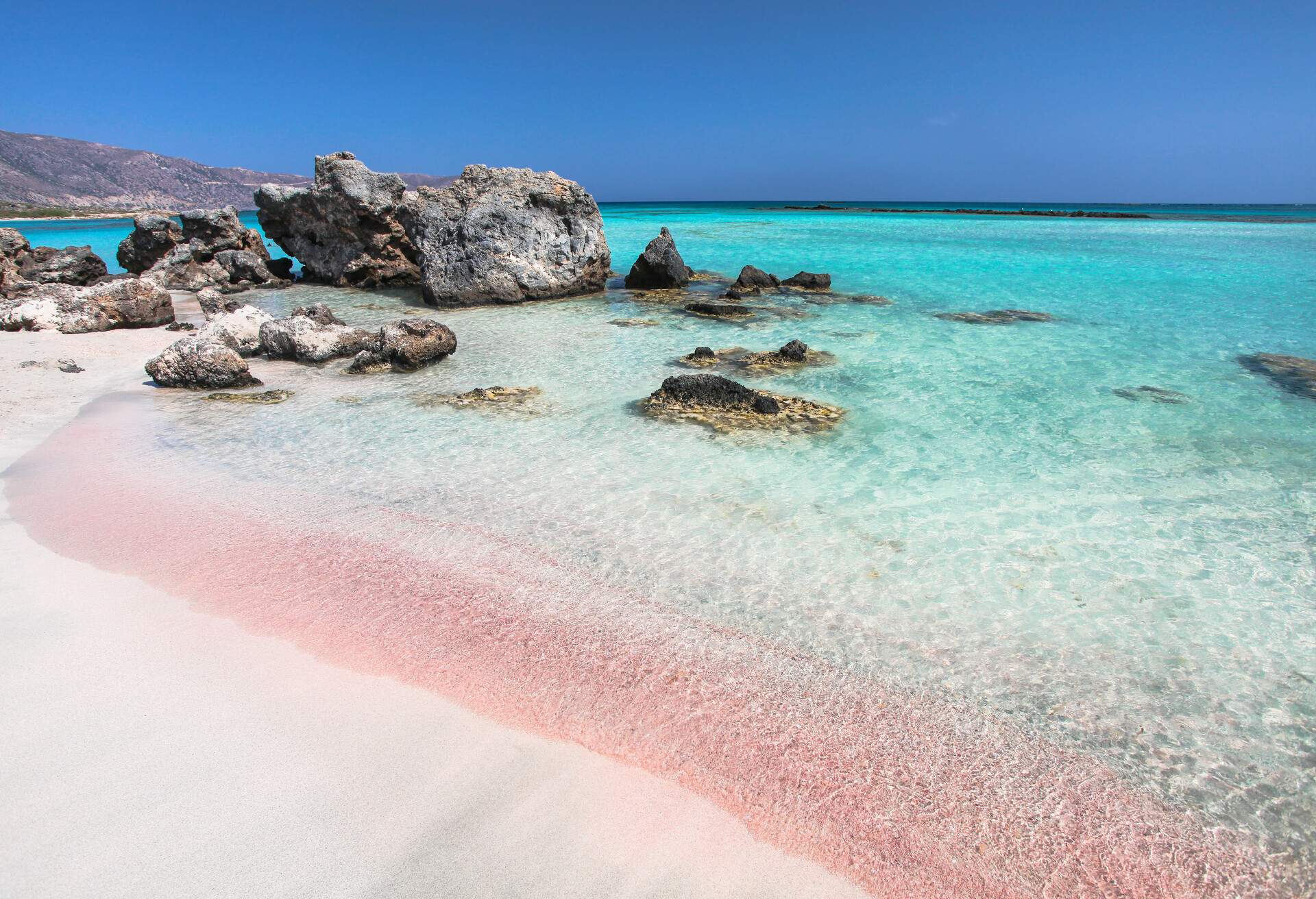 Coast of Crete island in Greece. Pink sand beach of famous Elafonisi (or Elafonissi).