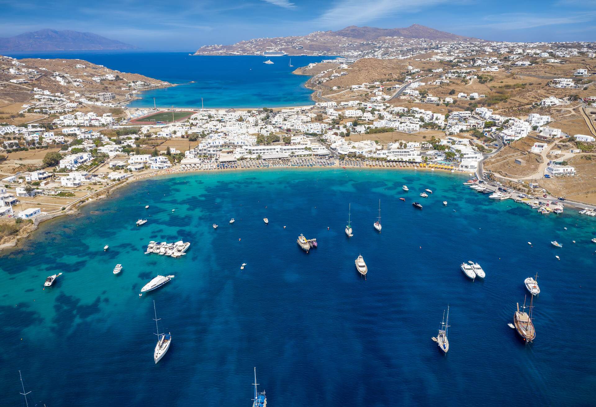 DEST_GREECE_MYKONOS_ORNOS-BEACH_GettyImages-1038045964