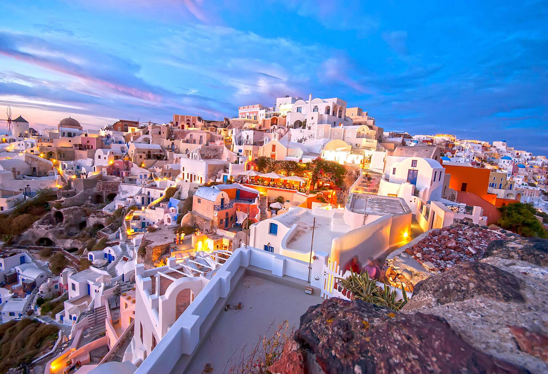 Oia Santorini Greece famous with beautiful romantic sunsets; Shutterstock ID 213351994; Purpose: ; Brand (KAYAK, Momondo, Any):