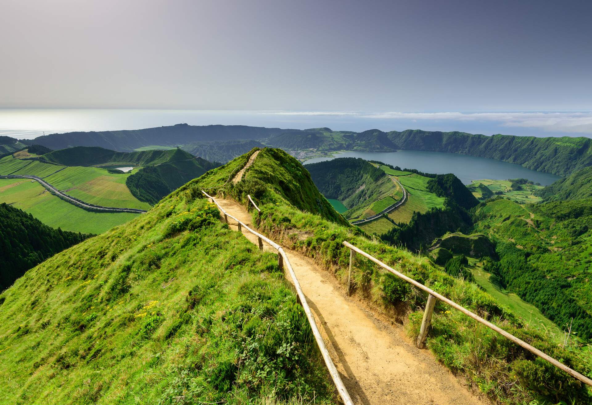 Panoramic landscape from Azores lagoons. The Azores archipelago has volcanic origin and the island of Sao Miguel has many lakes fand is the best travel destination of Portugal.