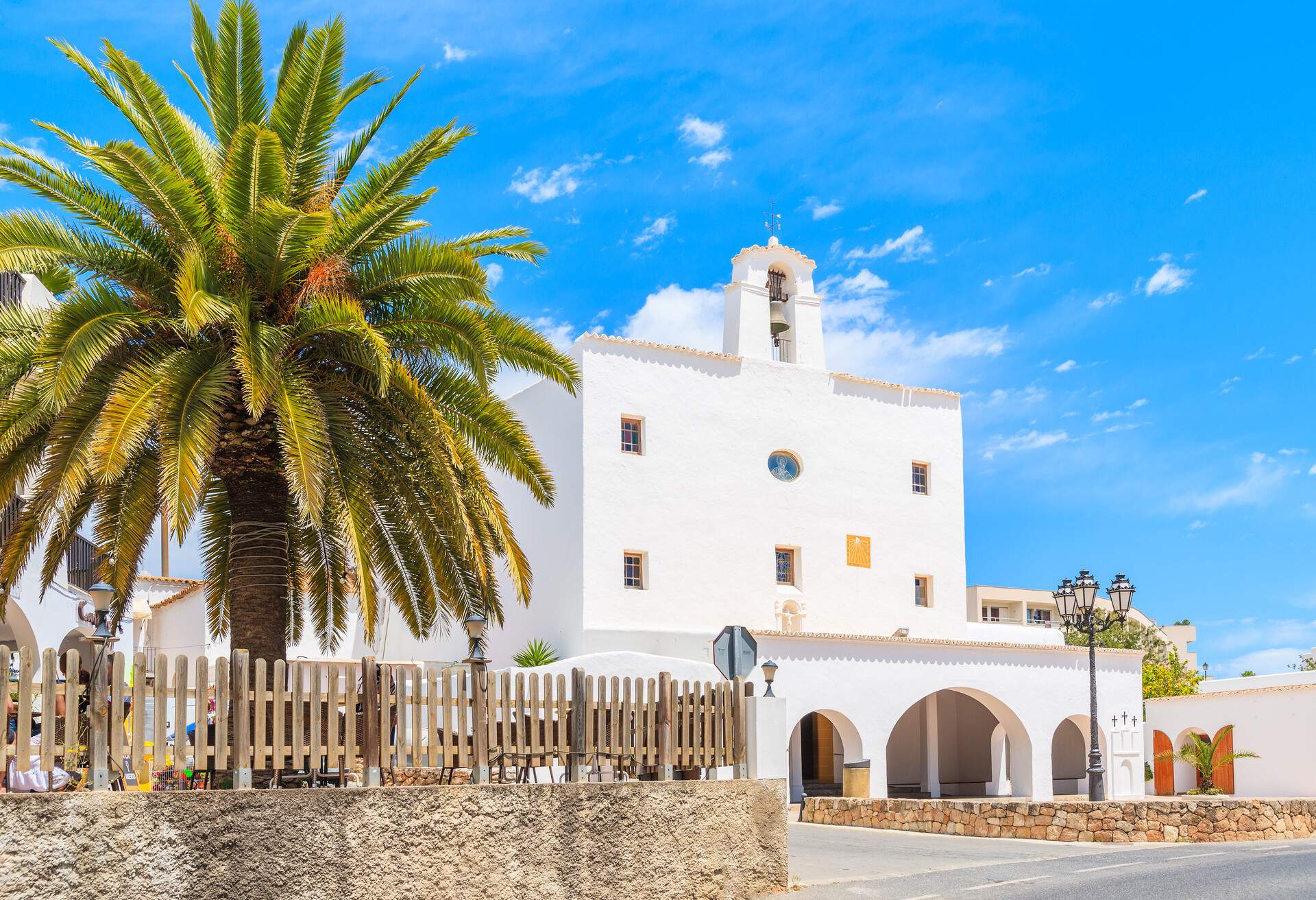 Typical white style church in Sant Josep de sa Talaia town on Ibiza island, Spain; Shutterstock ID 648681823; Purpose: CITY; Brand (KAYAK, Momondo, Any): KAYAK