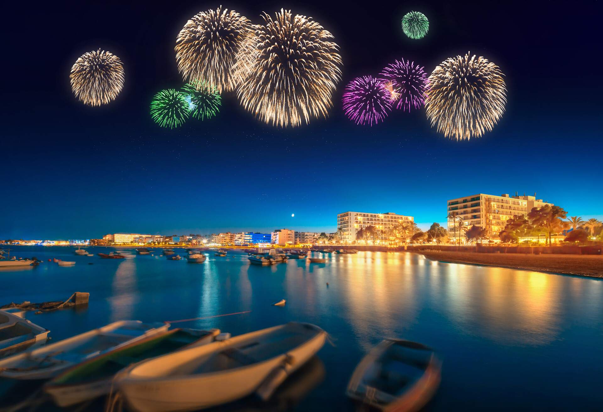 Beautiful fireworks under Ibiza island night view in San Antonio; Shutterstock ID 340877150