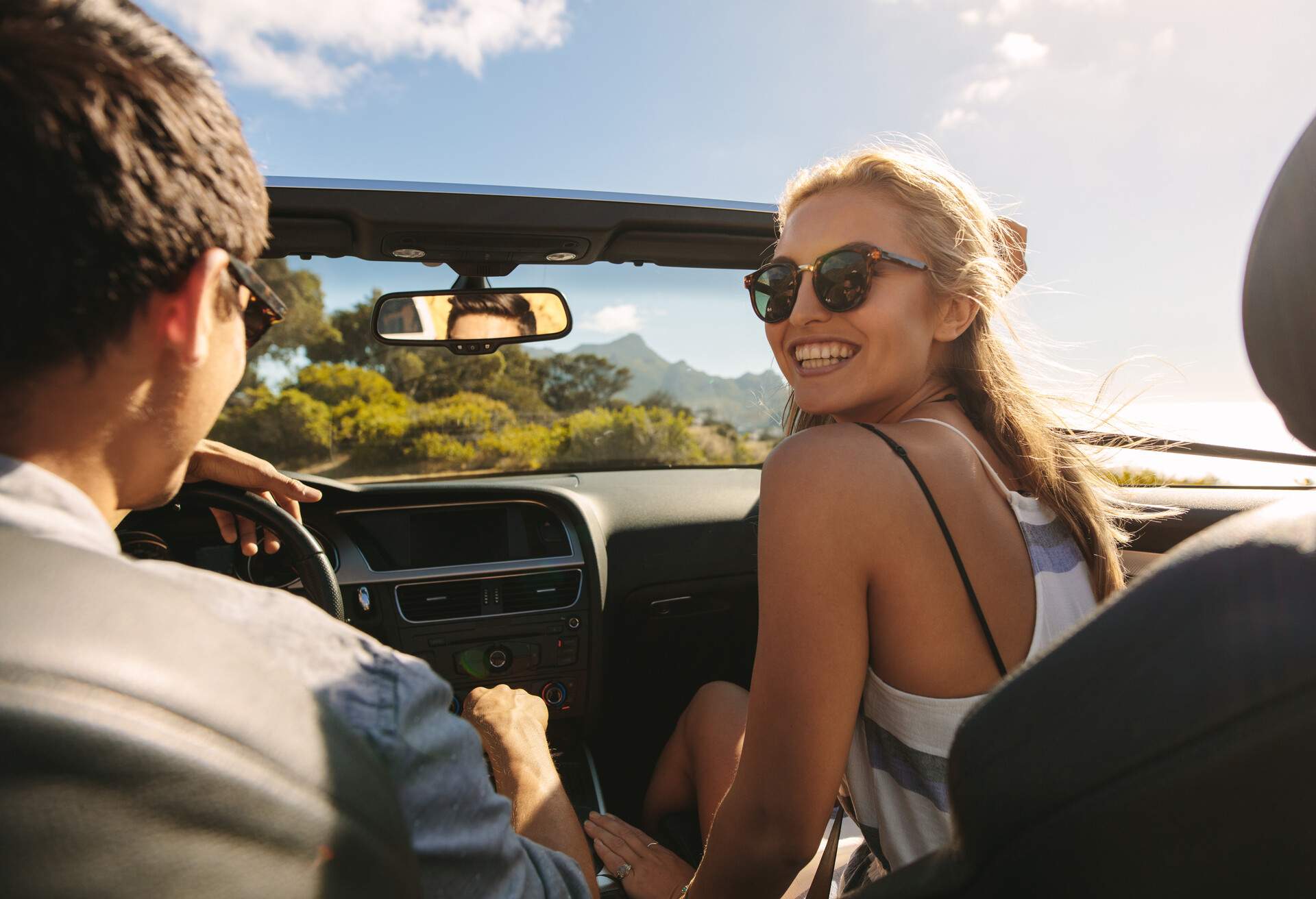 theme_people_person_car_travel_drive_couple_friends_vacation-shutterstock