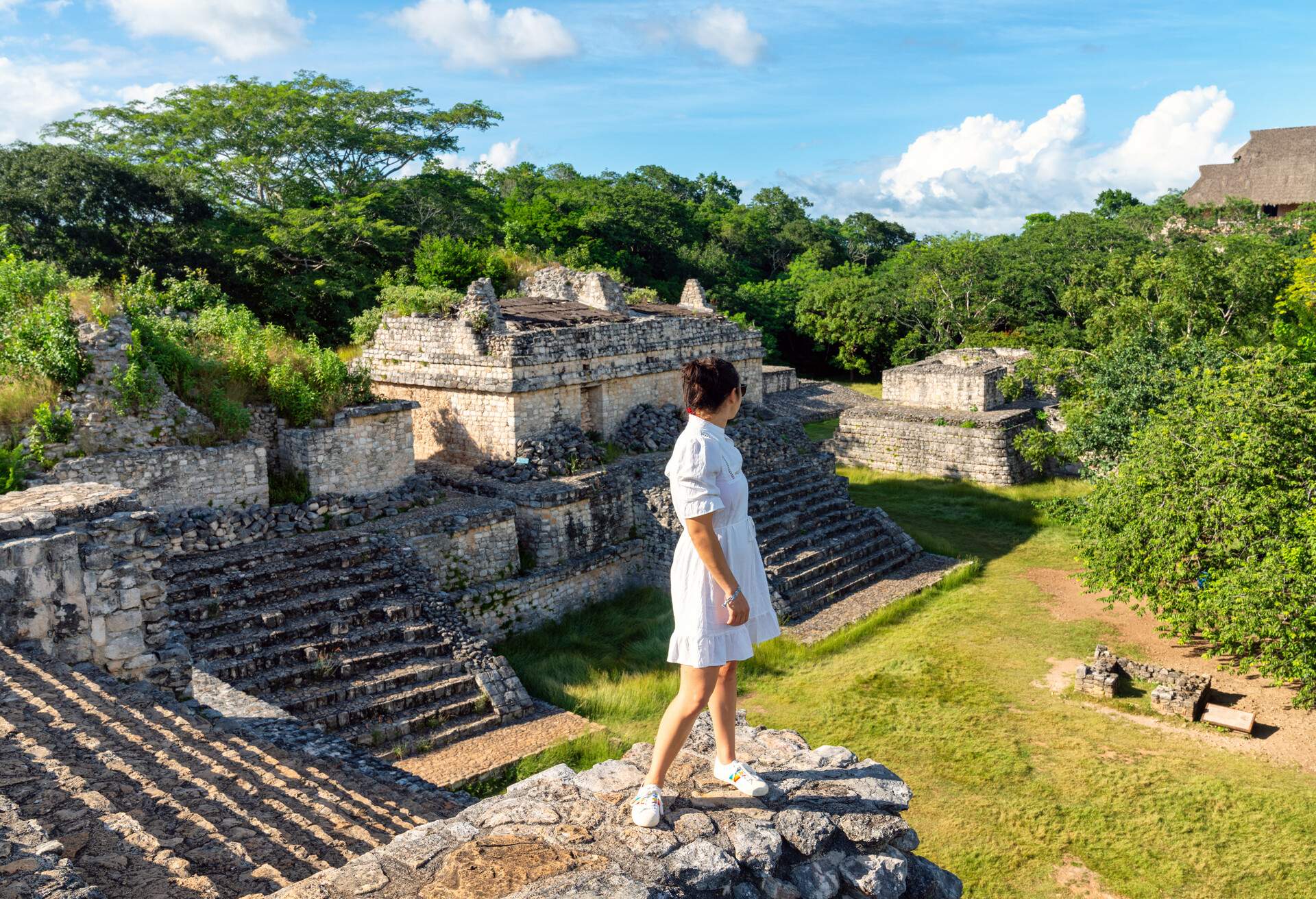 DEST_MEXICO_YUCATAN_MAYAN-RUINS_PERSON_WOMAN_GettyImages-1189827718