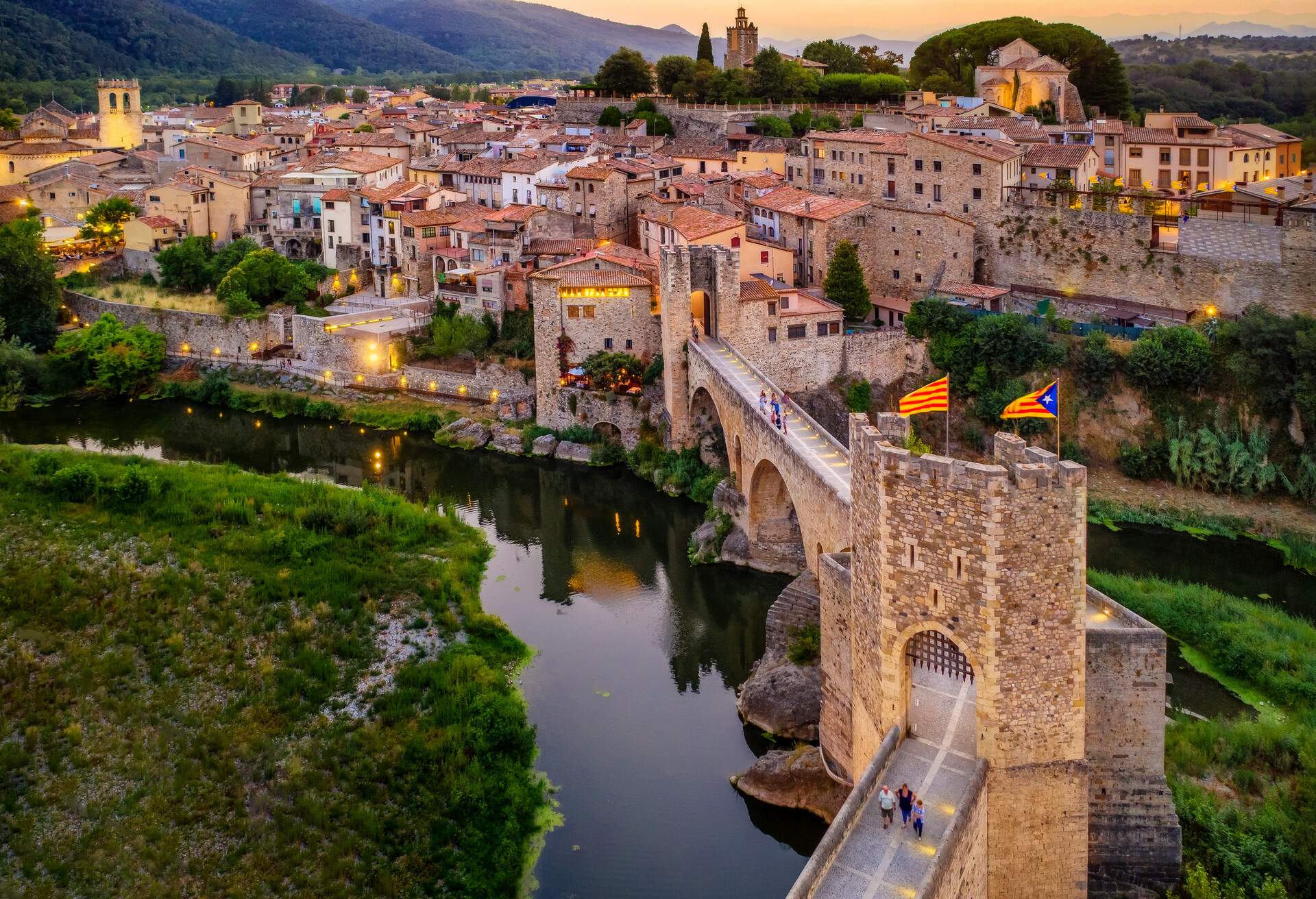 aerial view of the Medieval bridge of the Besalu at sunset. Catalonia, Spain