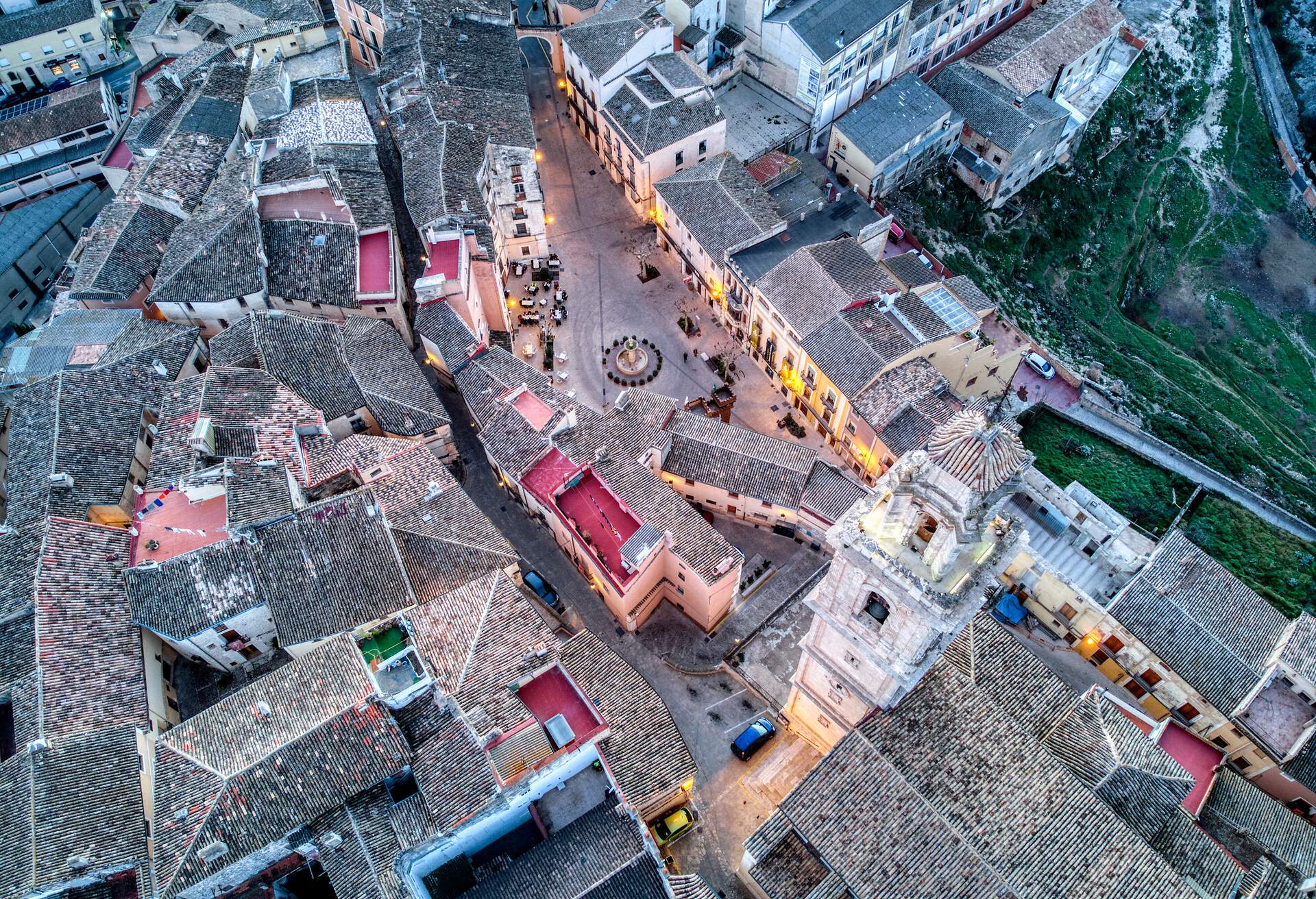 Aerial view of the narrow streets of an old medieval building village located on a small hill, town of Bocairent, declared combination historical artistic set, placed in the Valencian Community, Valencia, Spain Europe.