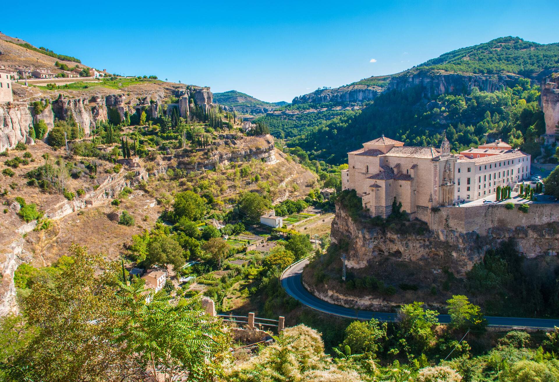 Looking down on the gorge on a sunny day with blue sky and cloud Cuenca City, Cuenca Province, Castille La Mancha, Spain, Europe.