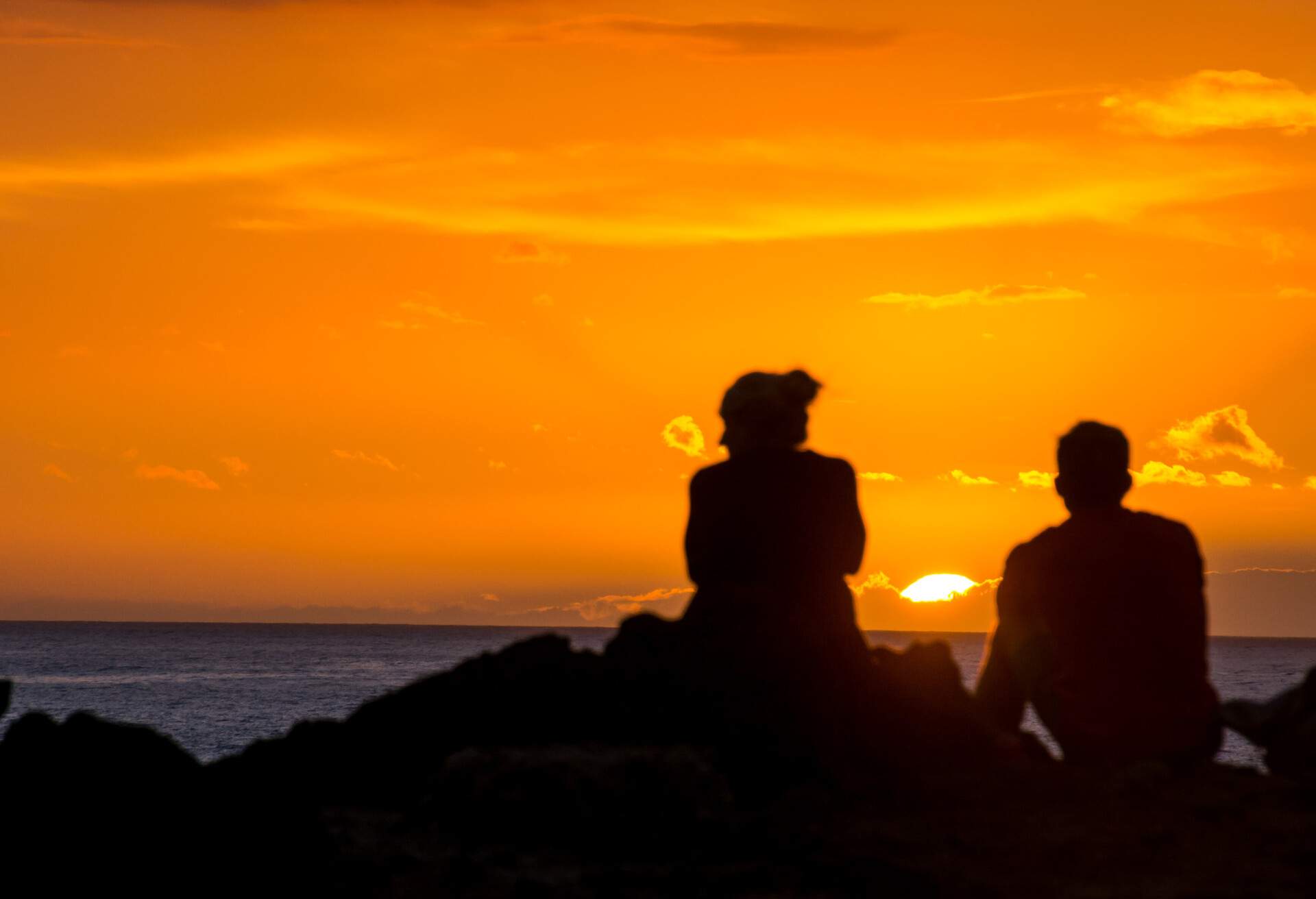 DEST_SPAIN_TENERIFE_THEME_PEOPLE_SUNSET_SEA_GettyImages