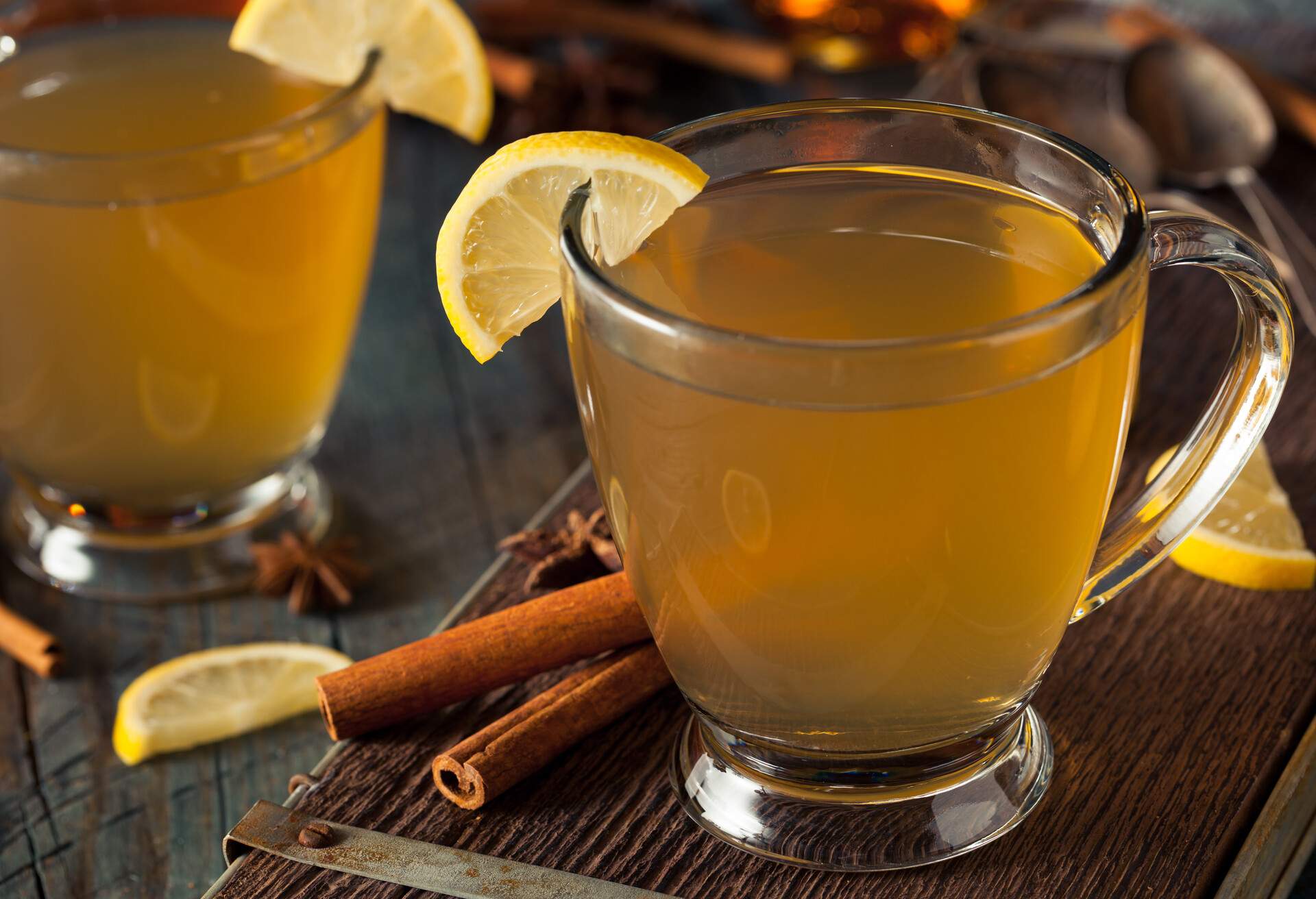 Warm Hot Toddy with Lemon Bourbon and Spices; Shutterstock ID 346468967