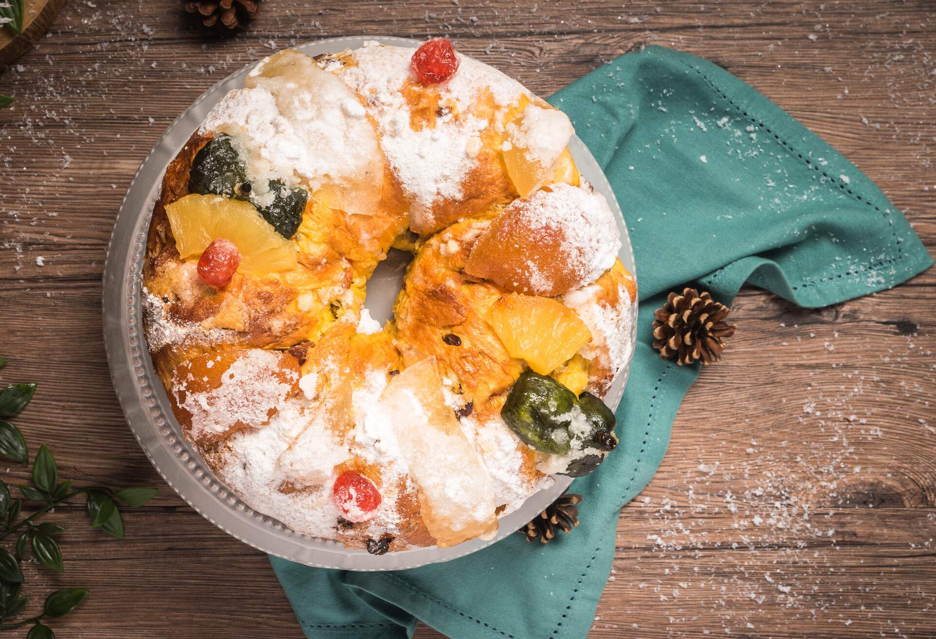 Bolo do Rei or King's Cake, Made for Christmas, Carnavale or Mardi Gras with Present Wrapping in Background