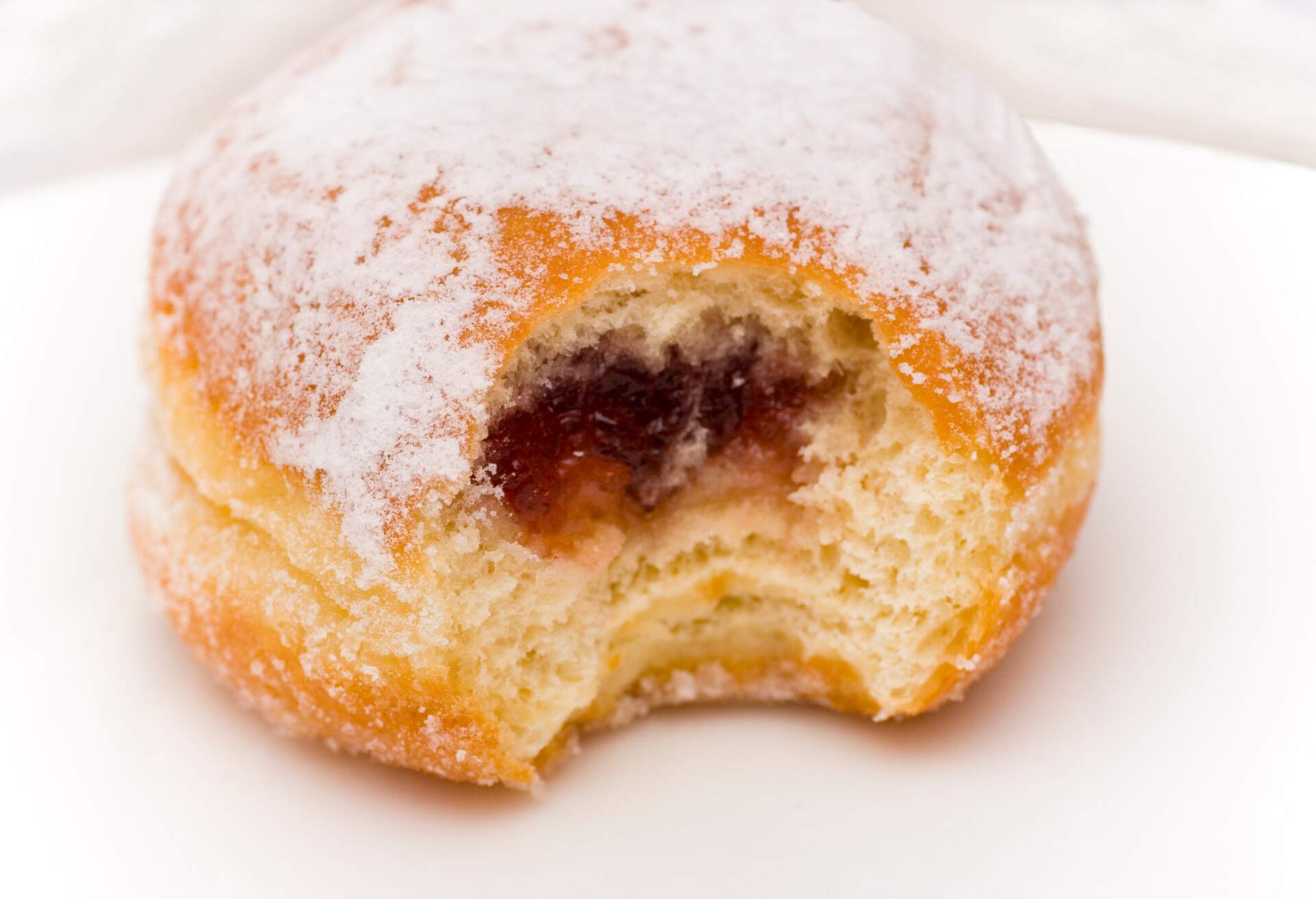 THEME_FOOD_GERMAN_BERLINER_JAM-DOUGHNUT_GettyImages-184961023