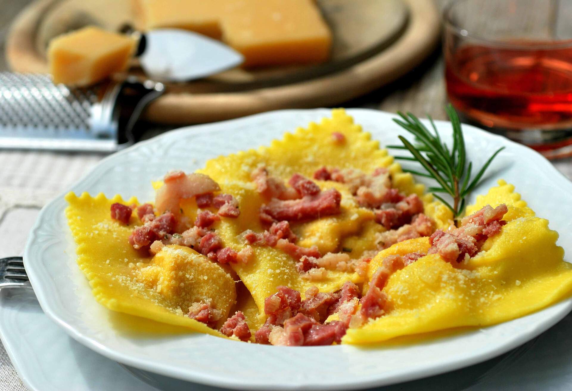 Old Modena tortelloni in white plate on outdoor table