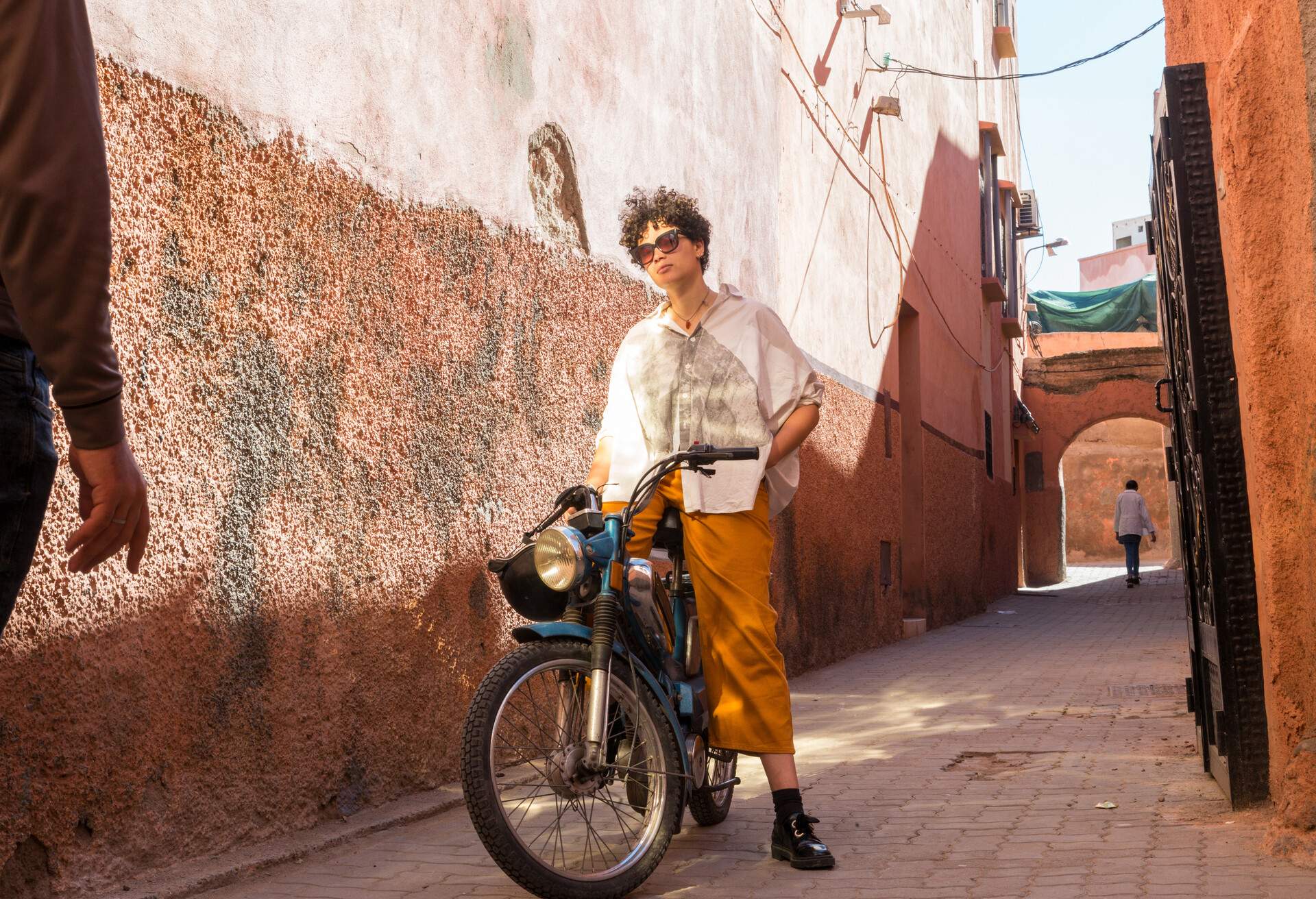 DEST_MOROCCO_MARRAKESH_THEME_MOPED_PEOPLE_WOMAN_GettyImages-1081003628