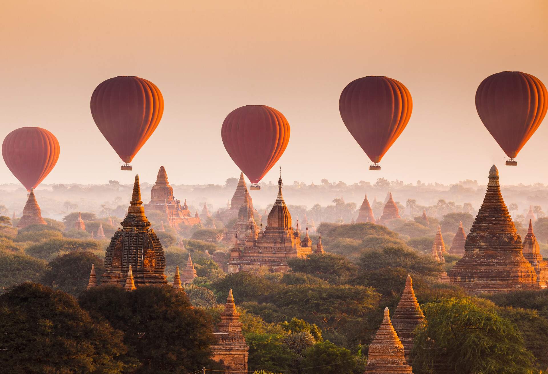 Hot air balloon over plain of Bagan at sunrise, Myanmar; Shutterstock ID 294386339; Purpose: KAYAK on-brand + dest imagery; Brand (KAYAK, Momondo, Any): KAYAK + All