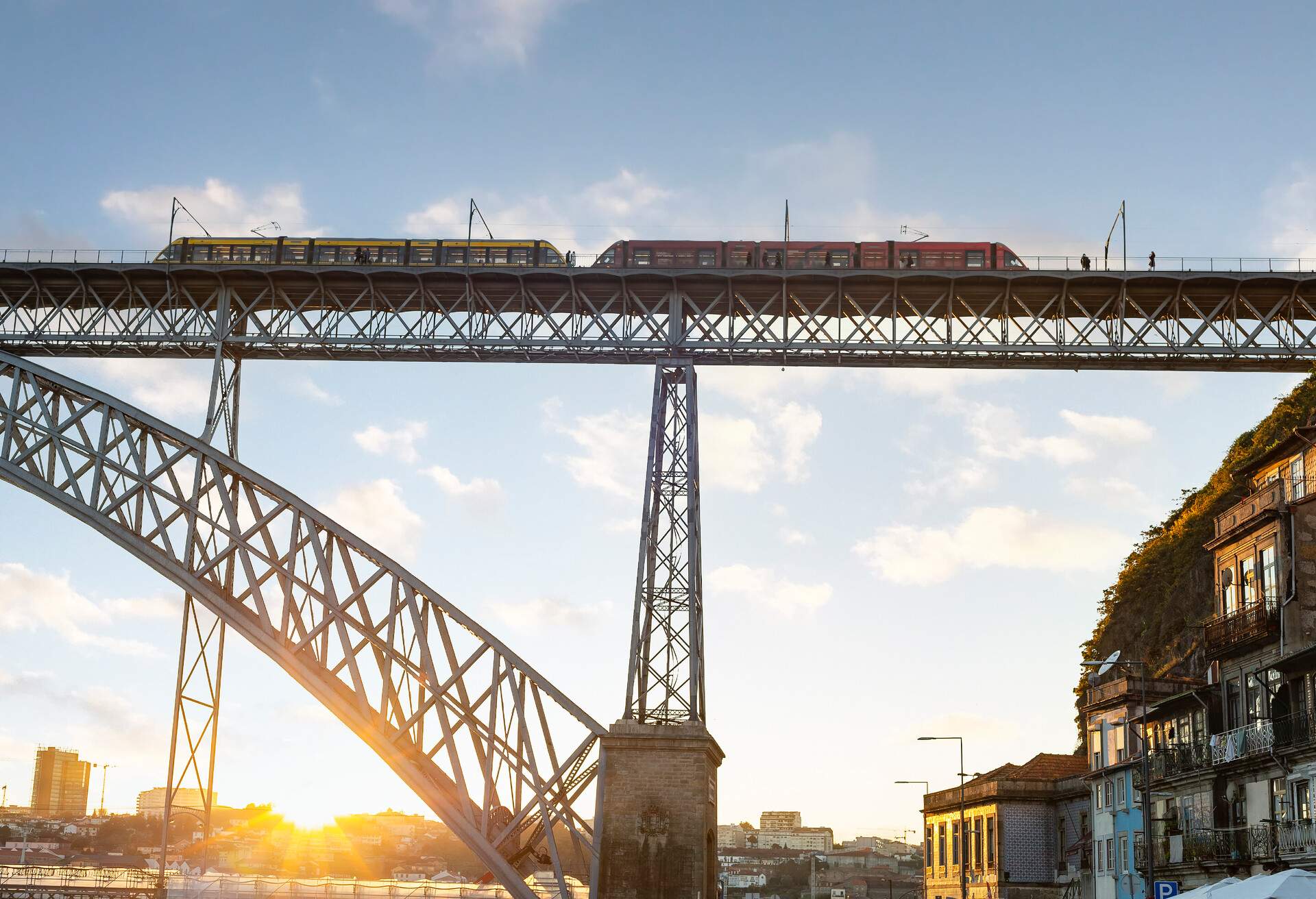 Scenic view of metro train at Luis bridge in sunset, Porto, Portugal