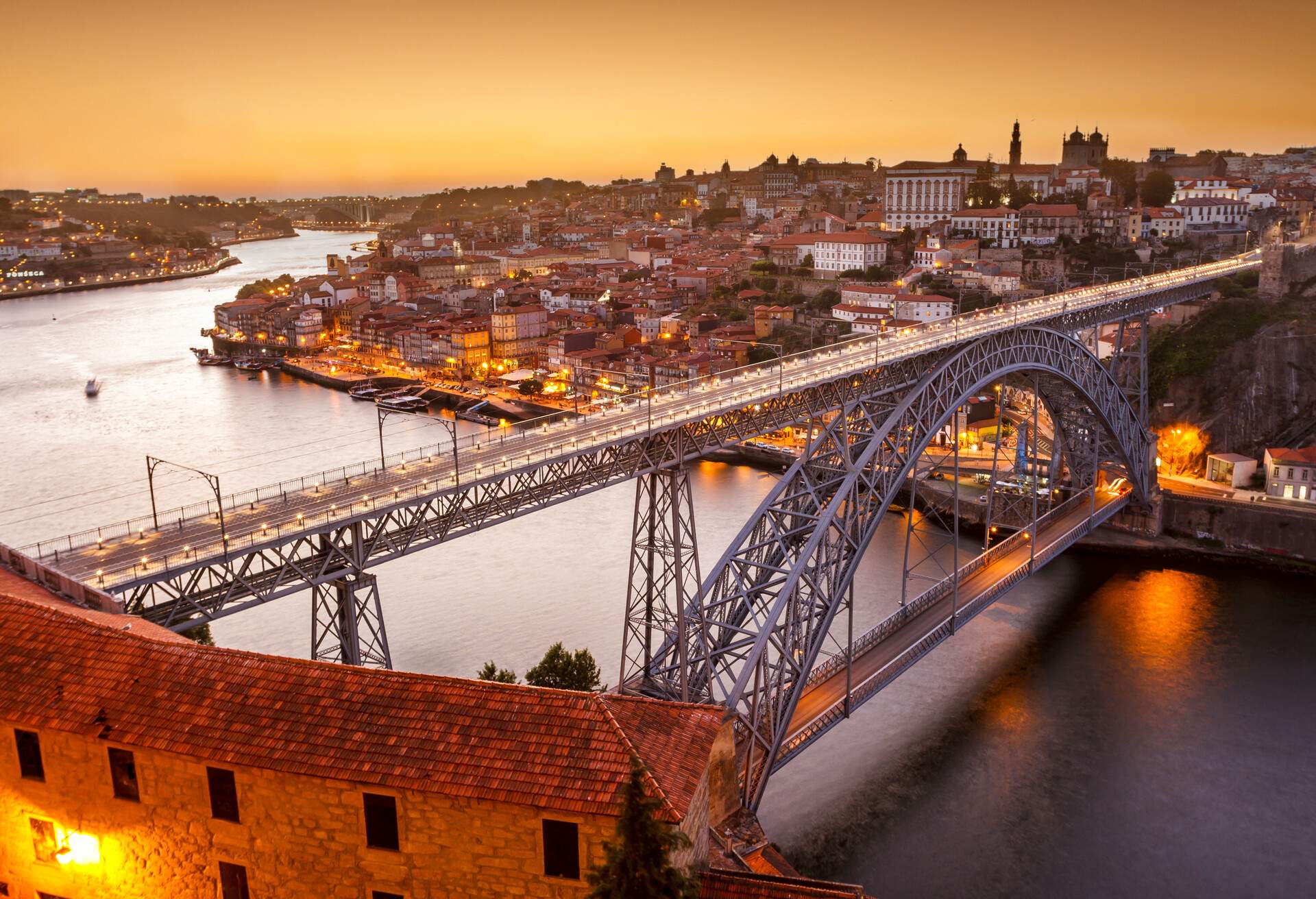 General view of Douro river and city of Oporto al sunset. Porto (Oporto), Portugal