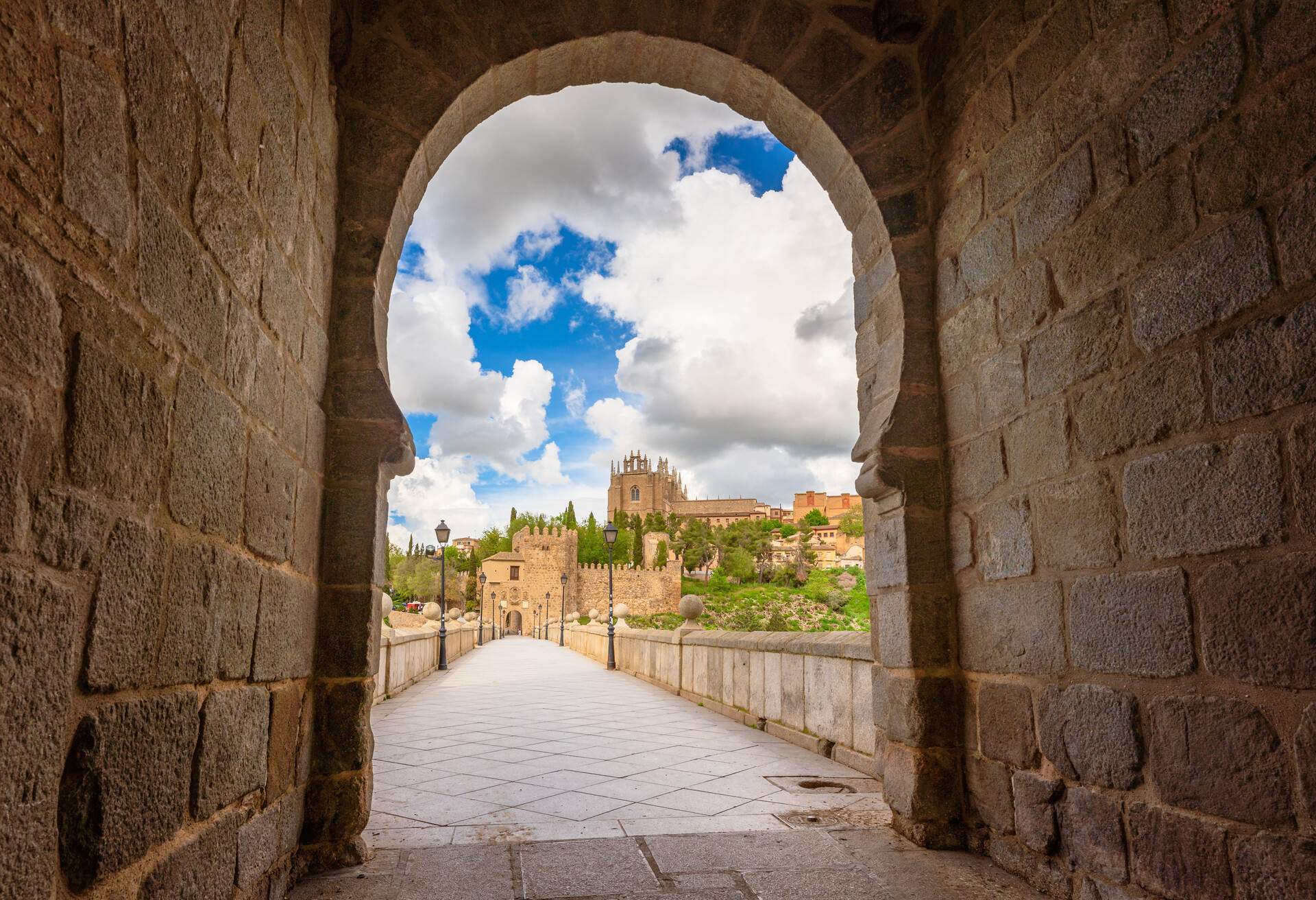 View of medieval pedestrian San Martin's bridge in  the Tagus River, Toledo, Spain