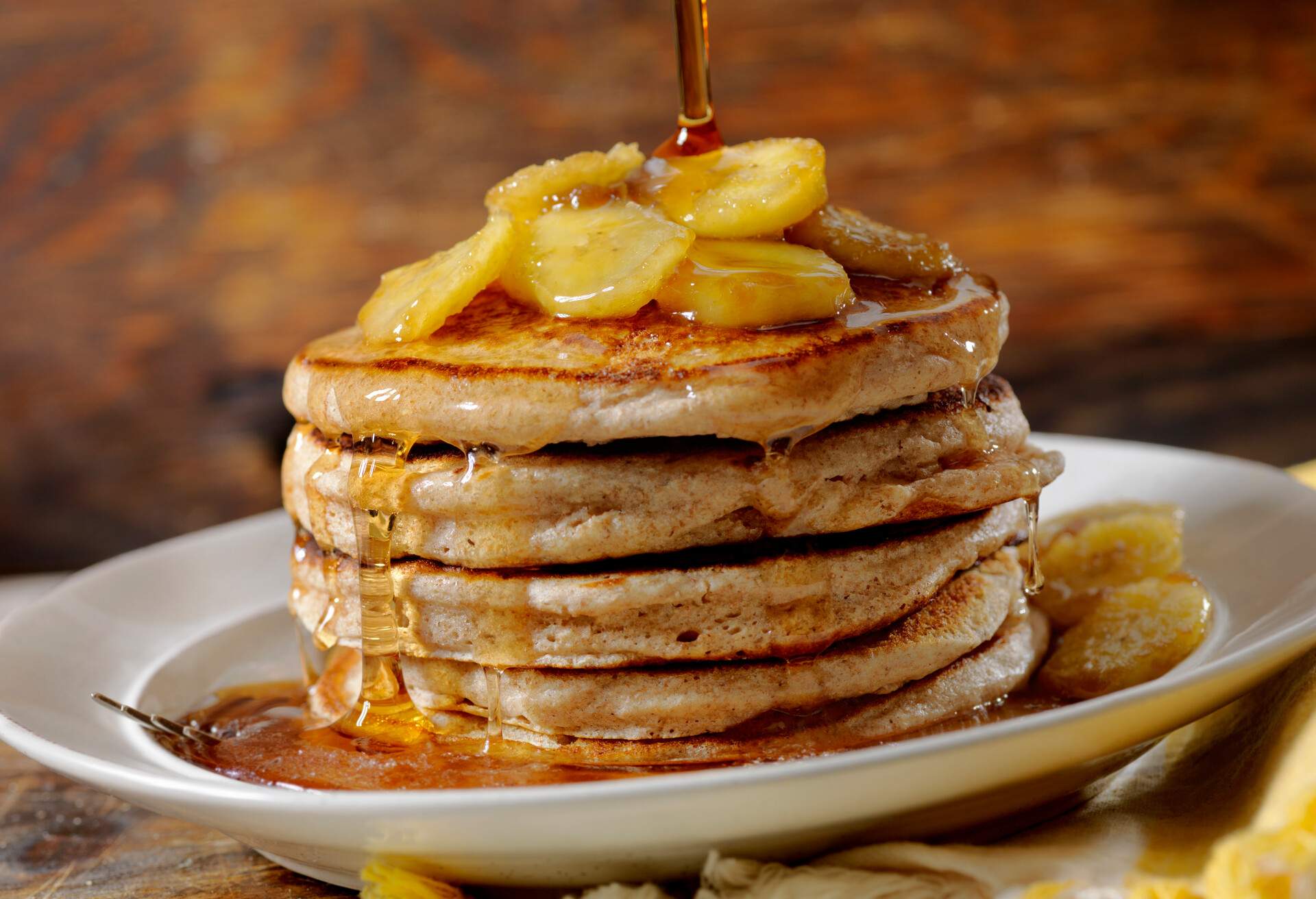 THEME_FOOD_CANADIAN_PANCAKES_SYRUP_GettyImages-1136828313