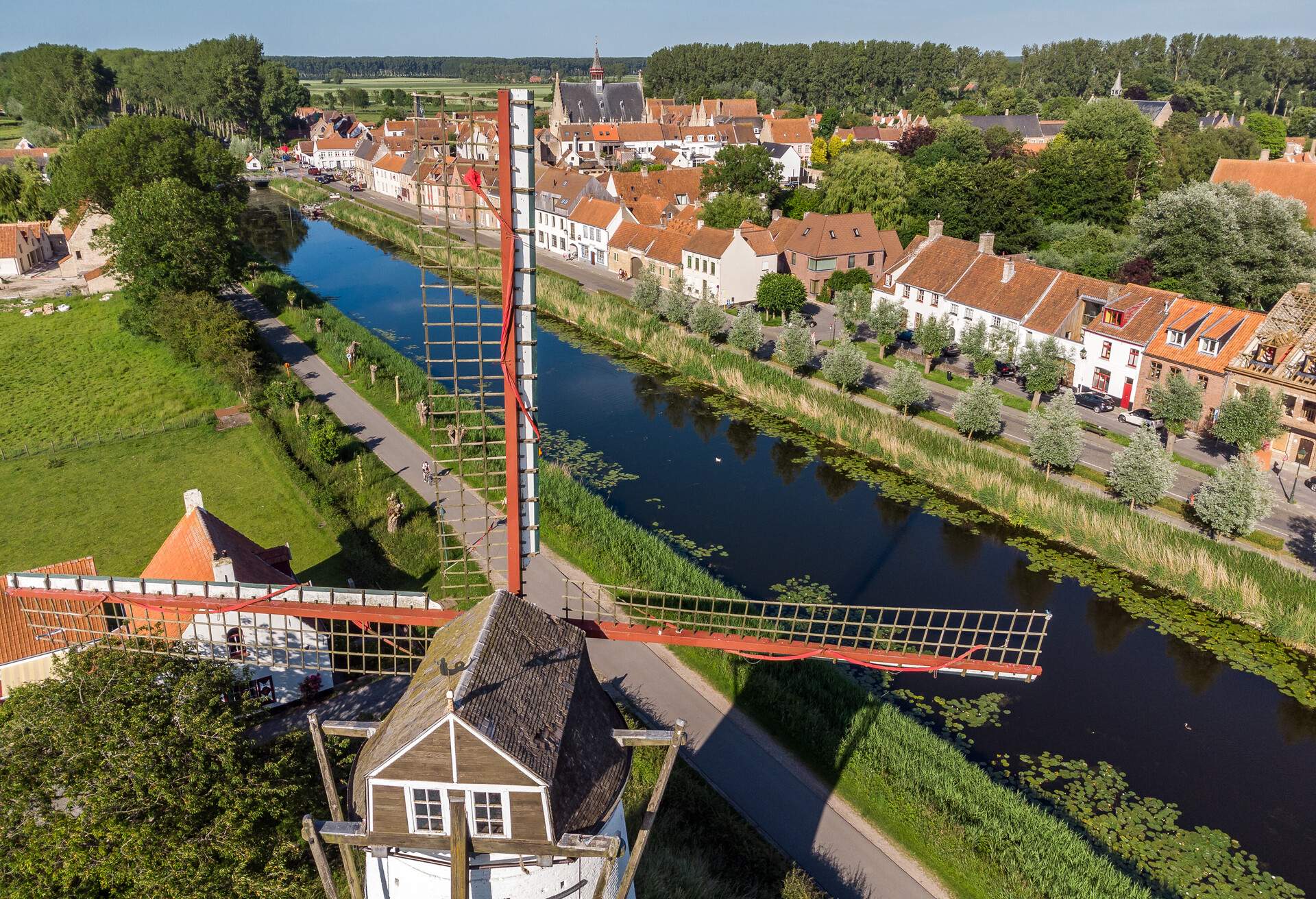 Aerial view of traditional windmill by Damse Vaart canal, Damme, Bruges, West Flanders, Flemish Region, Belgium