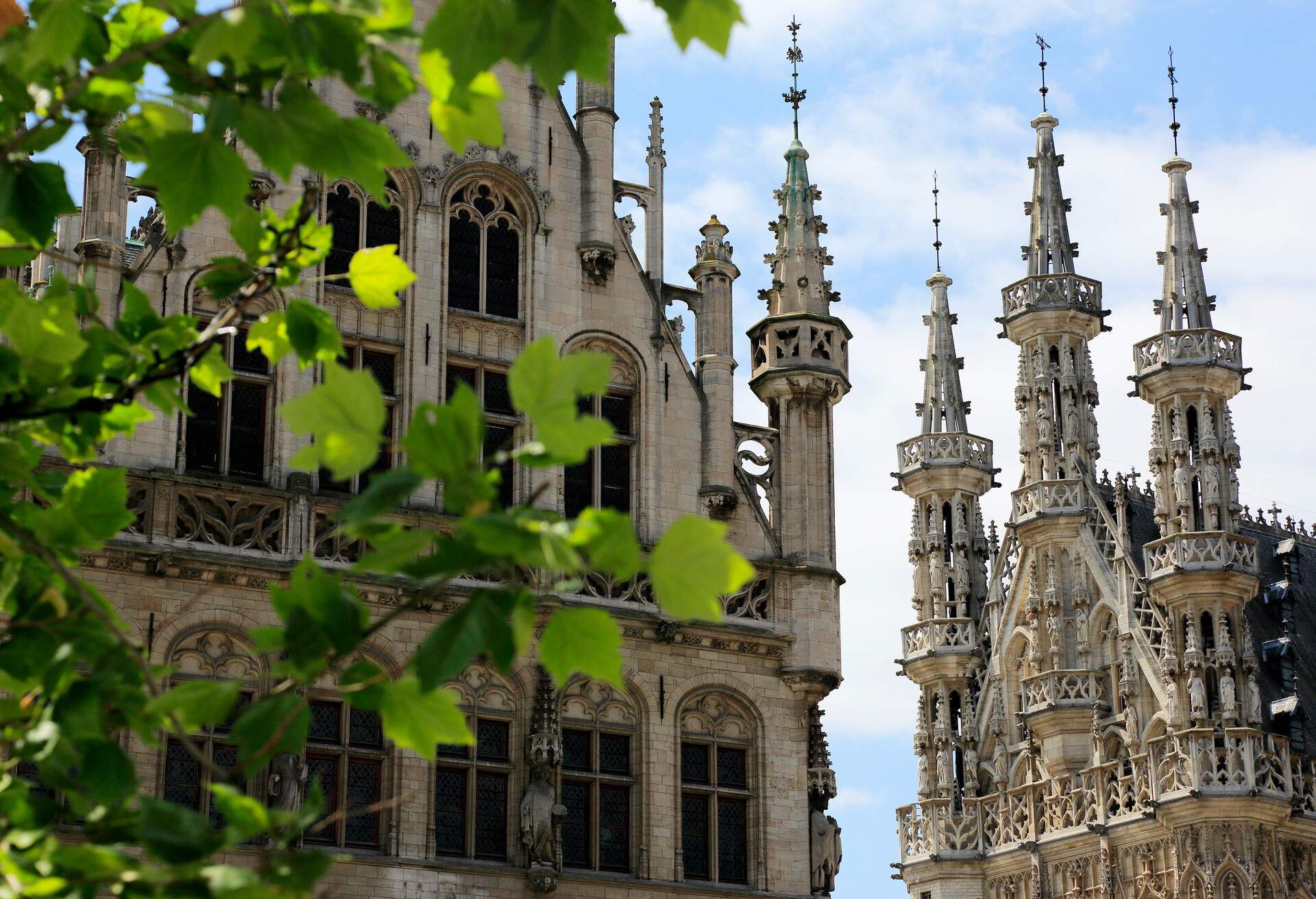 A closed up view of the towers of the 15th century's Brabantine Late Gothic style Town Hall in Market Square (Grote Markt).