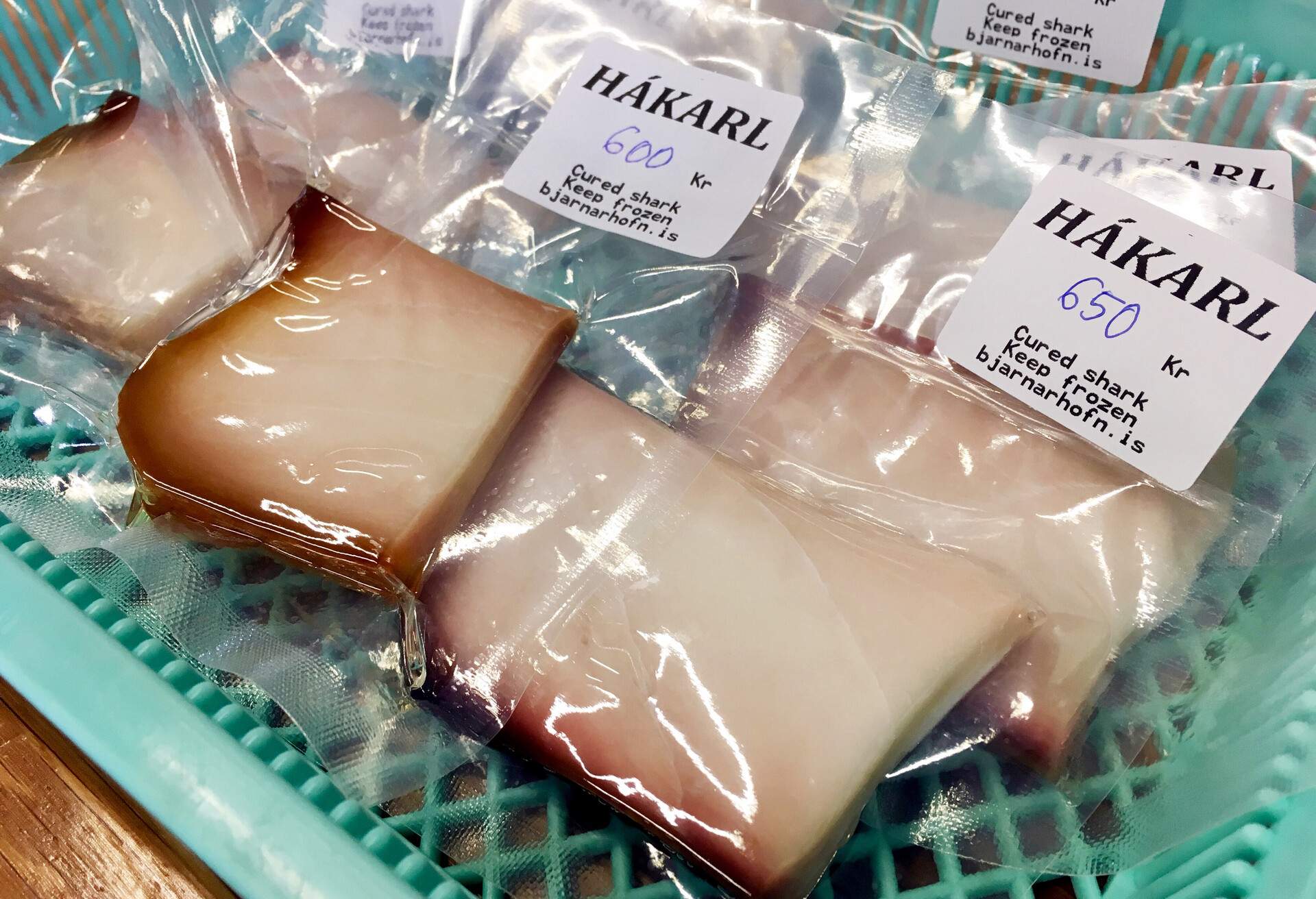 Packaged hákarl, fermented Greenland shark, for sale in a store in Iceland. The meat of the Greenland shark is poisonous when fresh, but after curing, fermenting and drying for four to five months, it becomes edible. The finished product is usually served in small cubes an is renowned for its extreme odor and taste of ammonia.
