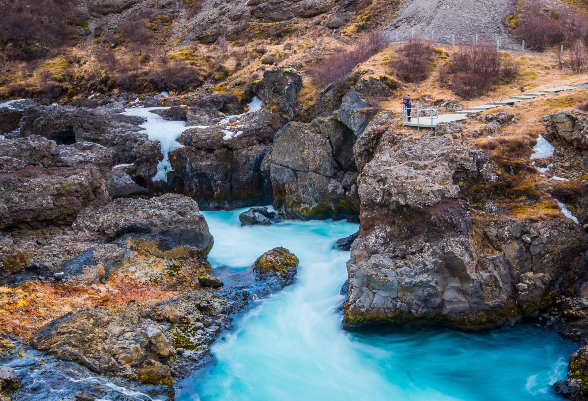 DEST_ICELAND_HRAUNFOSSAR_Barnafoss waterfall_GettyImages-654260056
