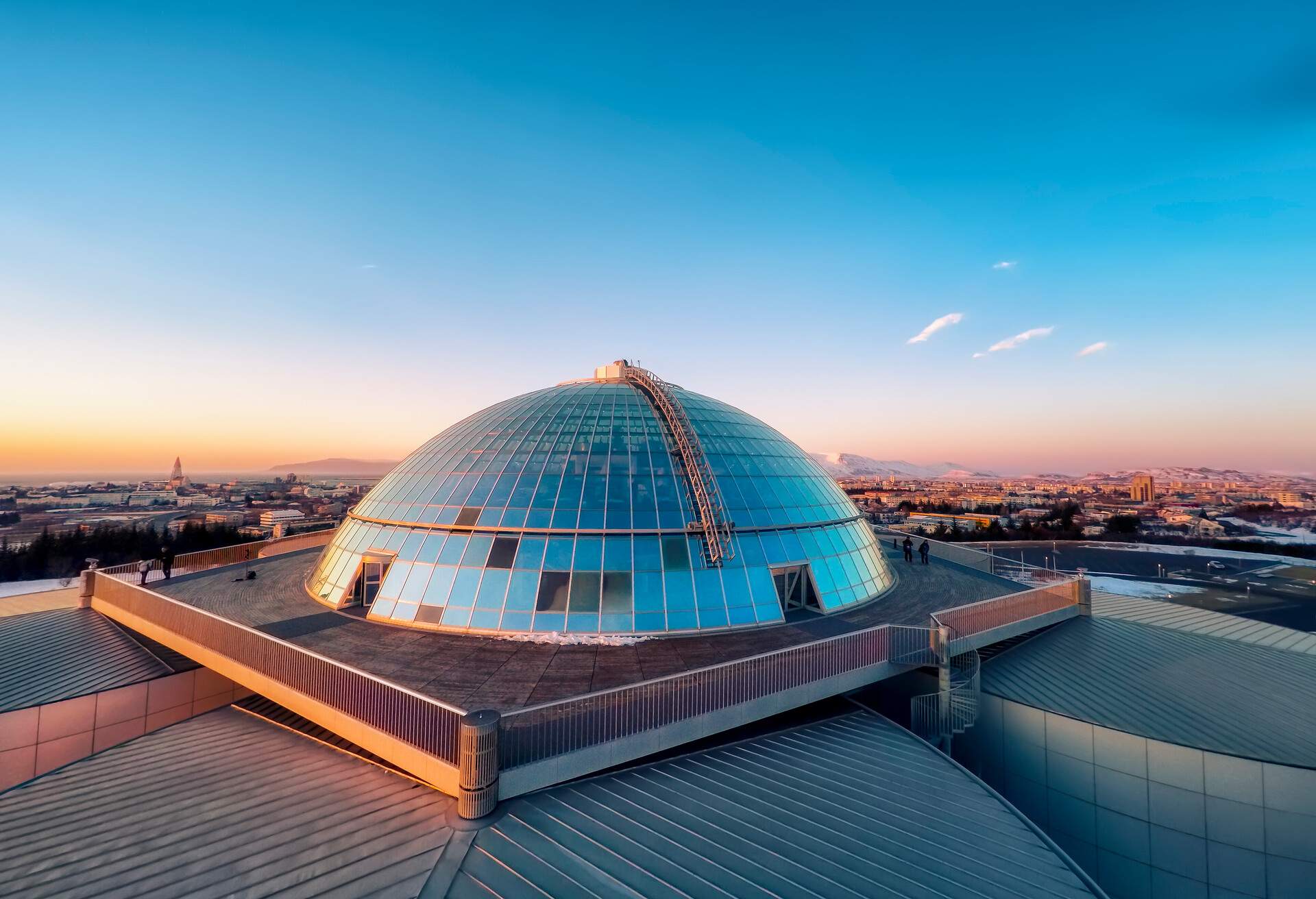 Top view of The Pearl (Perlan) shot using a drone, Reykjavik, Iceland. The Pearl (Perlan) is built on the top of huge tanks in which natural hot water is stored for heating Reykjavik. Restaurants, meeting halls and a museum are housed in the dome.