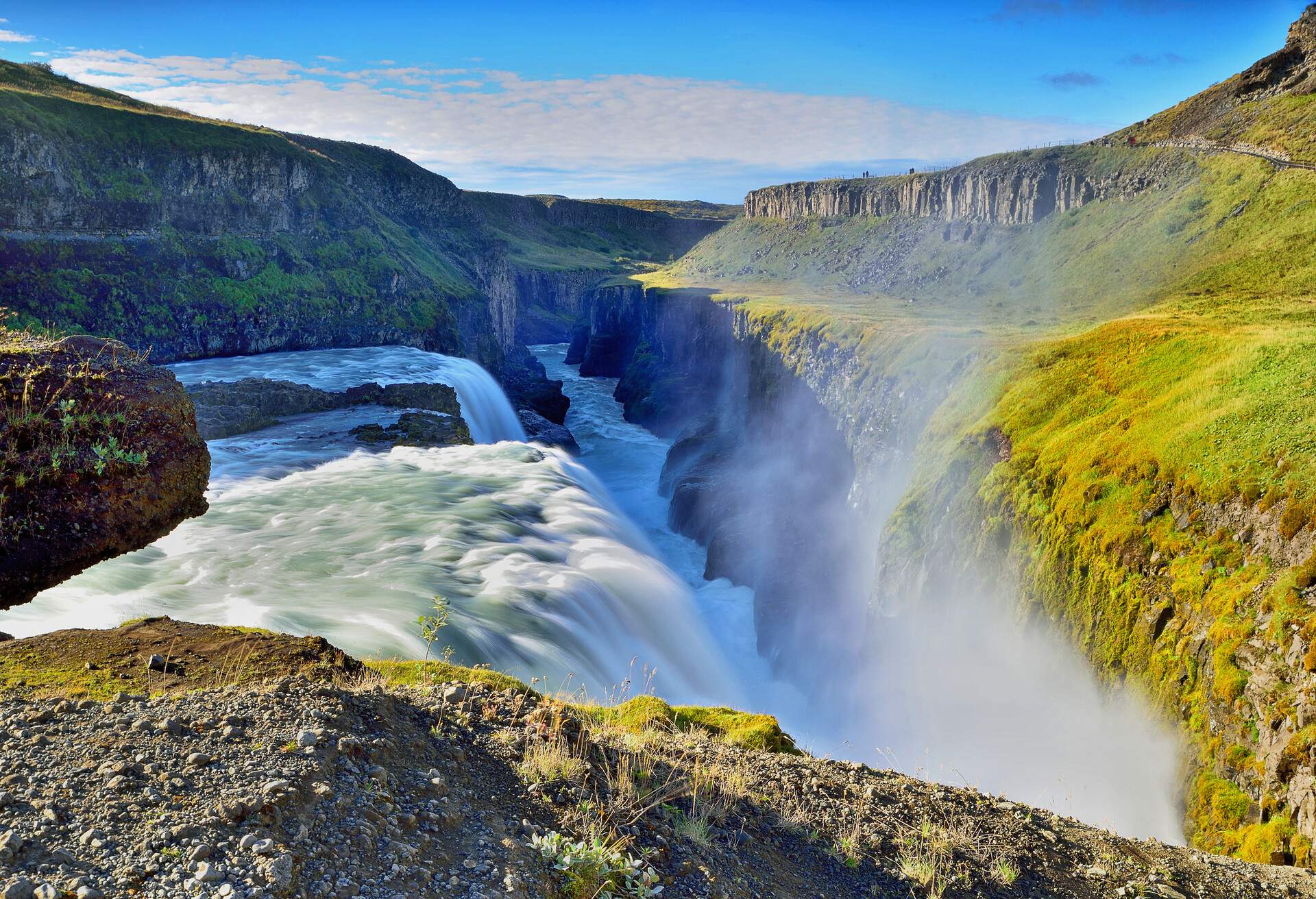 Beautiful landscape with a lower part of Gullfoss waterfall and a canyon of Hvita River in southwest Iceland..Gullfoss is one of the most popular tourist attractions in Iceland. The wide Hvítá flows down into a wide curved three-step 