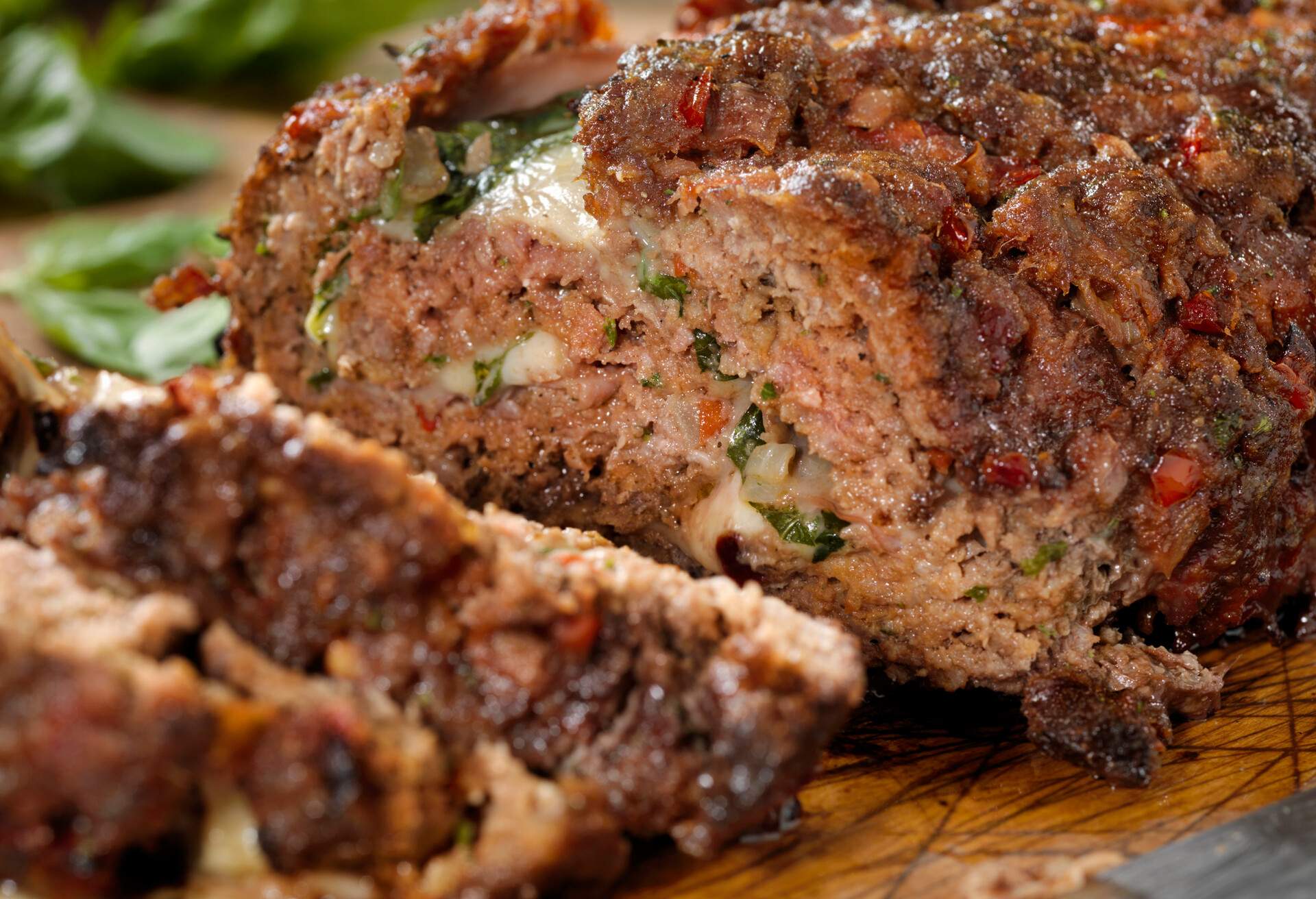 Sicilian Style Rolled Meatloaf with Deli Ham, Basil and Mozzarella