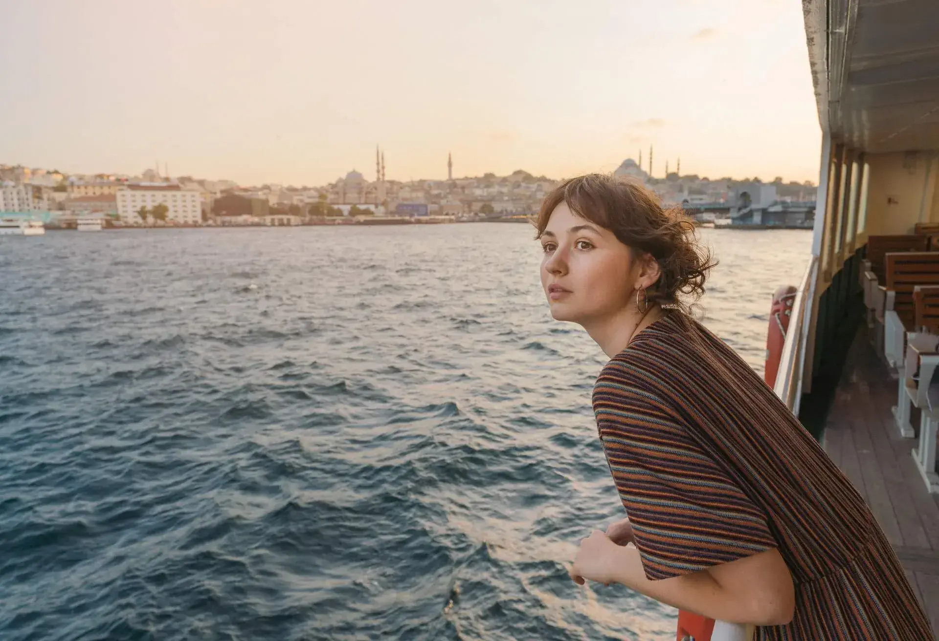 DEST_TURKEY_ISTANBUL_BOSPHORUS_PEOPLE_WOMAN_BOAT_FERRY_GettyImages-1336299420