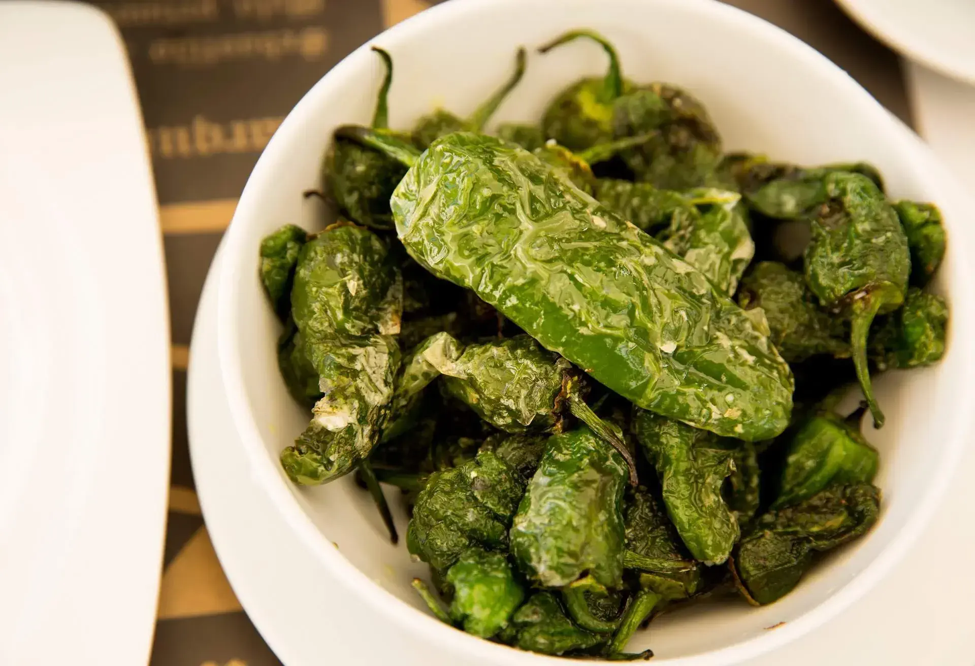 THEME_FOOD_SPANISH_PIMIENTOS-DE-PADRON_GettyImages-1204613776
