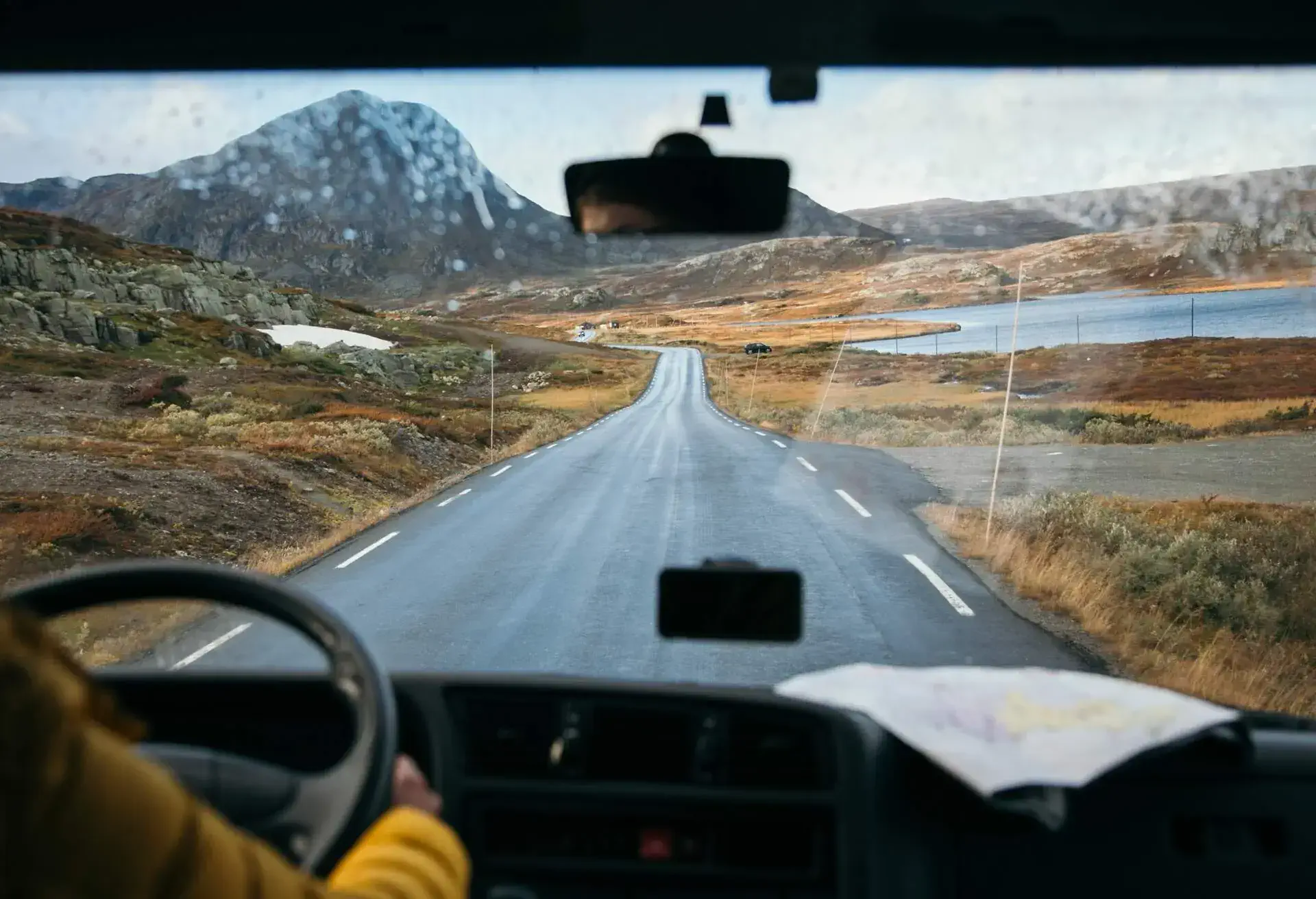 THEME_PERSON_CAR_CAMPER_VAN_ROAD_TRAVEL_MOUNTAINS-shutterstock-portfolio_1871059972