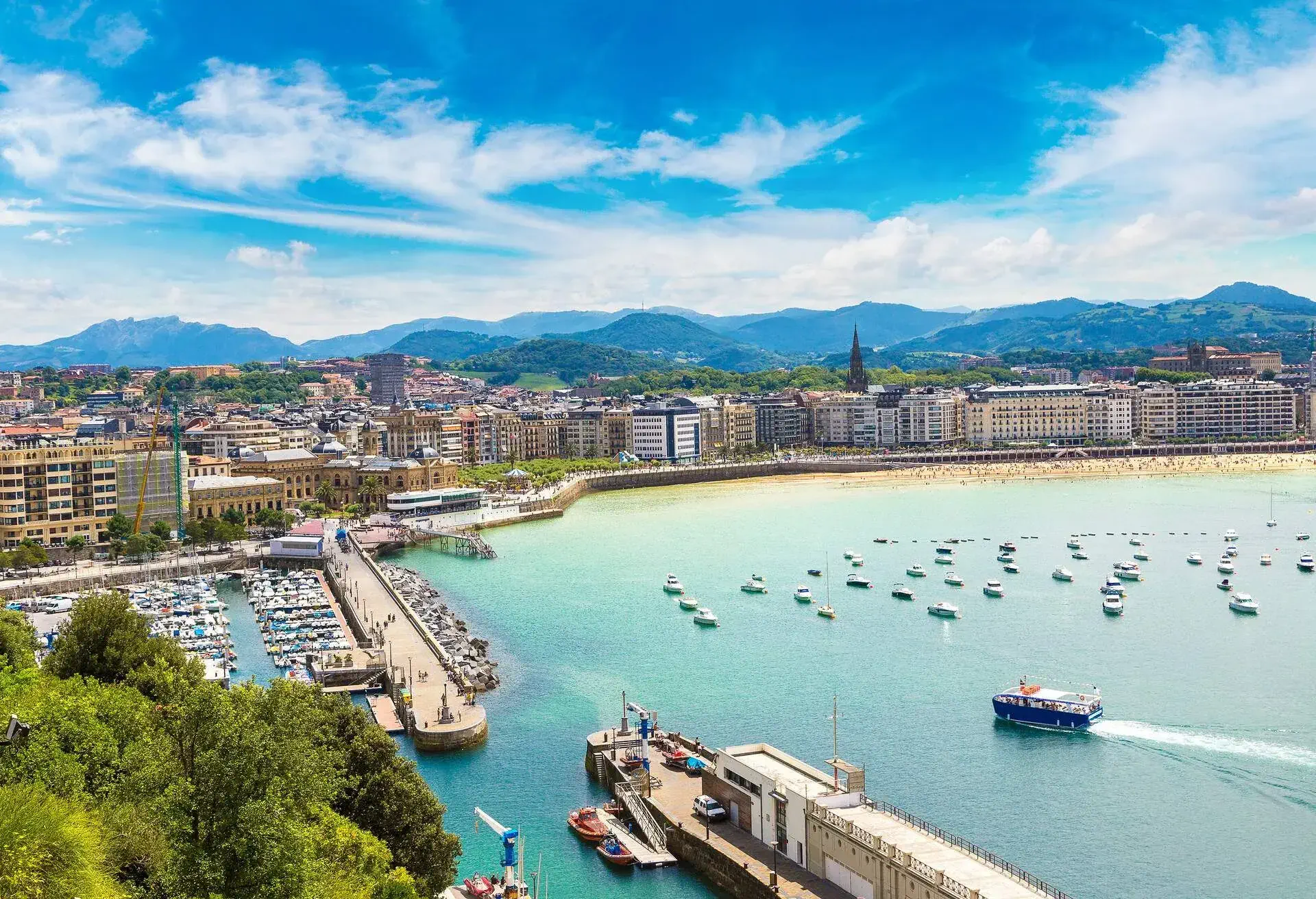 Old hardbour in San Sebastian (Donostia) in a beautiful summer day, Spain; Shutterstock ID 566915149; Purpose: Destiny; Brand (KAYAK, Momondo, Any): Any