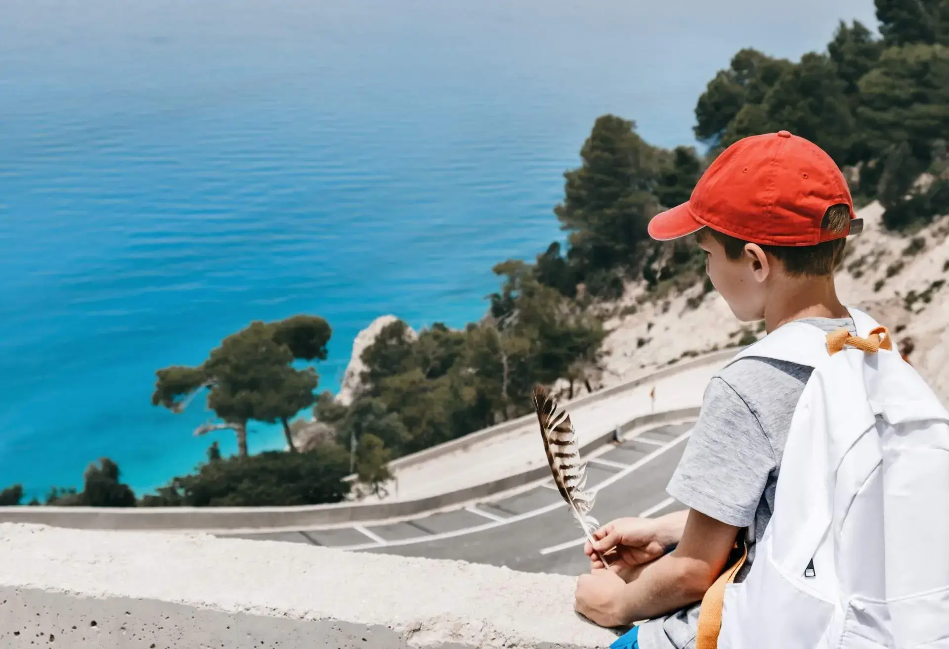 DEST_GREECE_LEFKADA_THEME_PEOPLE_KID_SEA_GettyImages-1326054841.jpg