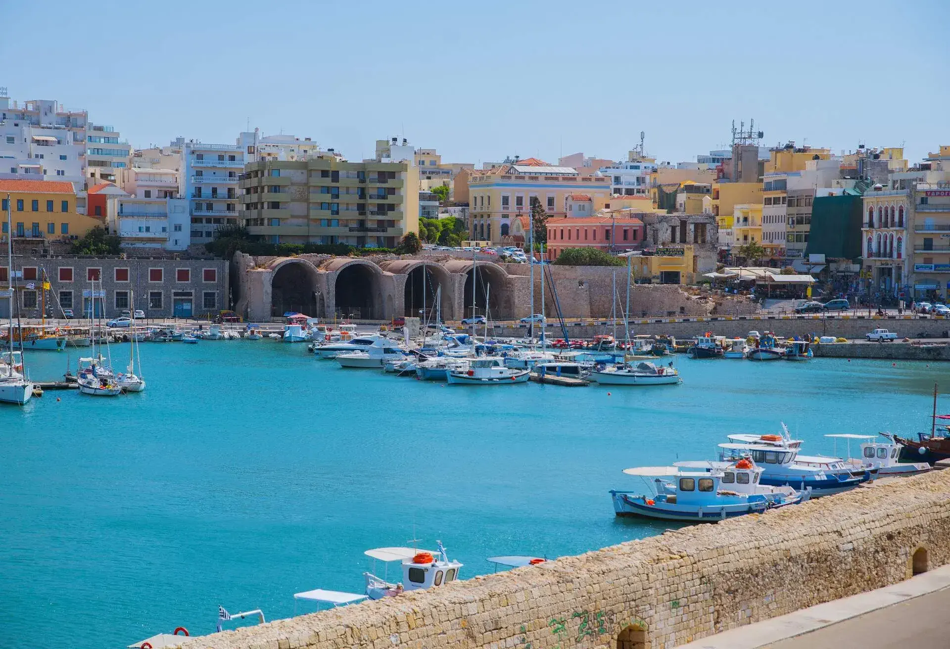Port with yachts and ships in the port of the ancient city of Heraklion; Shutterstock ID 1686477538