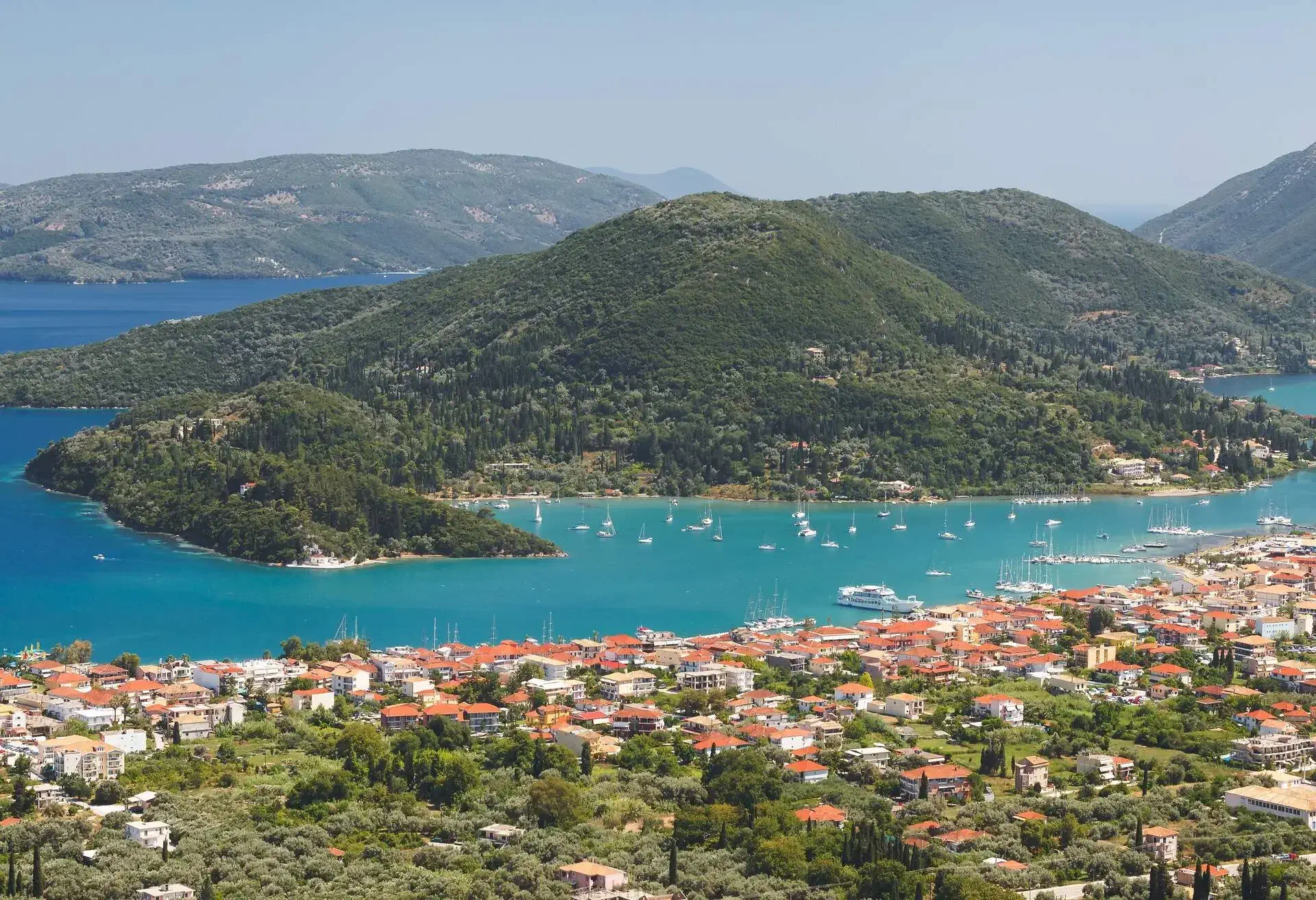 DEST_GREECE_VLICHOS-VILLAGE_VLICHOS-BAY_NIDRI-TOWN-LEFKADA_shutterstock-portfolio_452802688.jpg