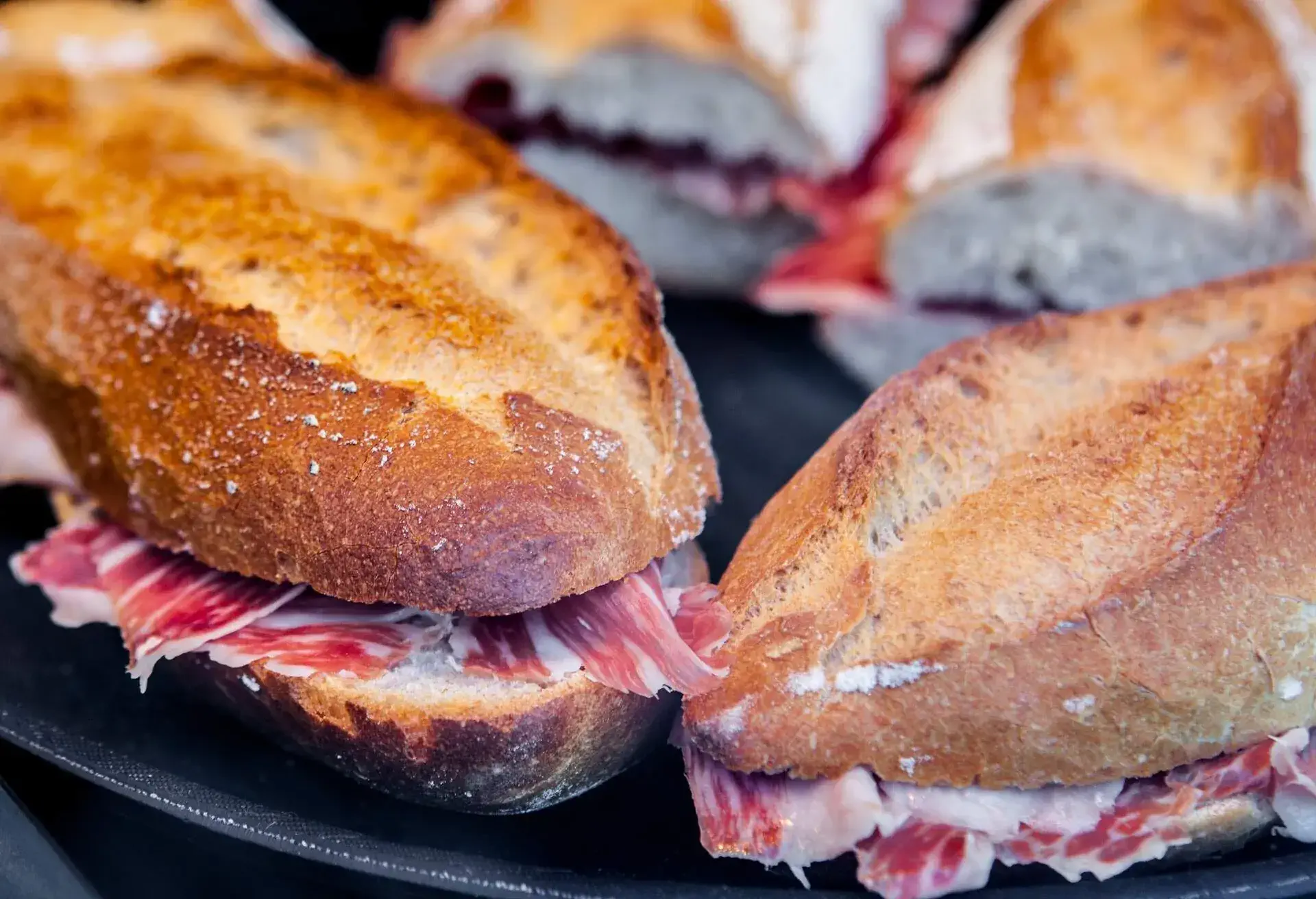 Closeup of a spanish bocadillos of cured ham or ham serrano sandwich