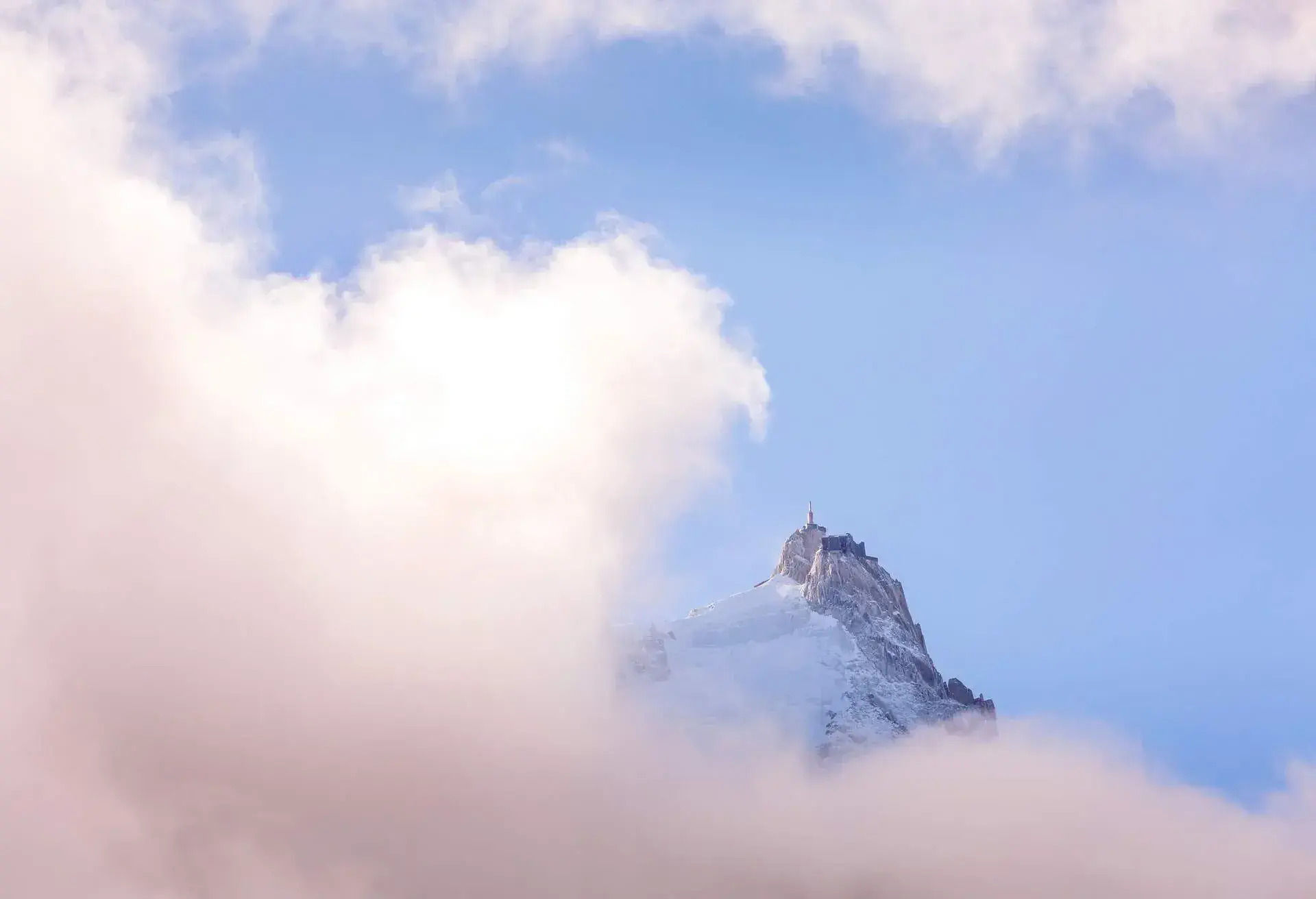 Fantastic evening snow mountains landscape background. French Alps, Aiguille du Midi, Chamonix Mont-Blanc, France