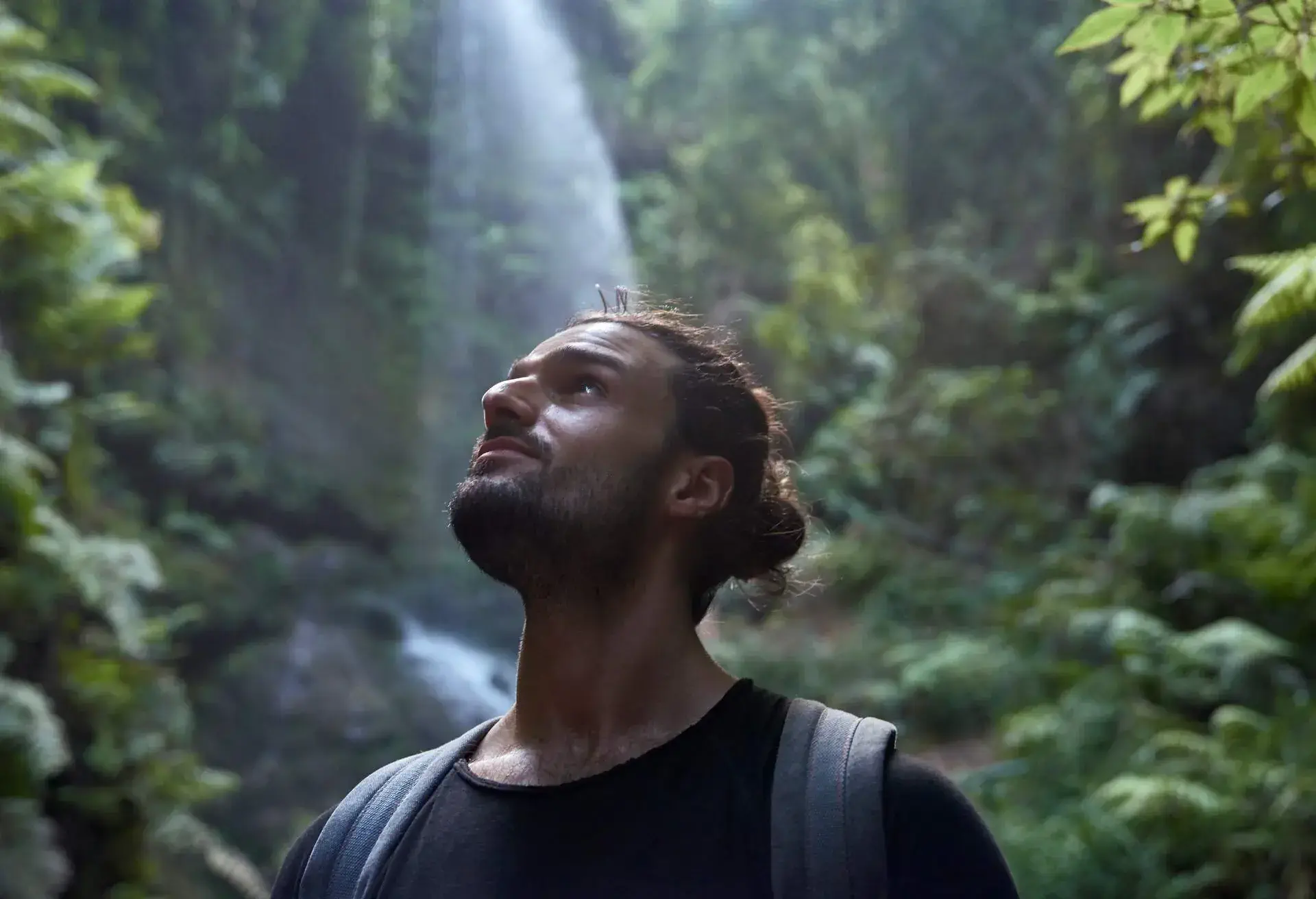 DEST_SPAIN_WATERFALL_THEME_PEOPLE_MAN_HIKE_GettyImages
