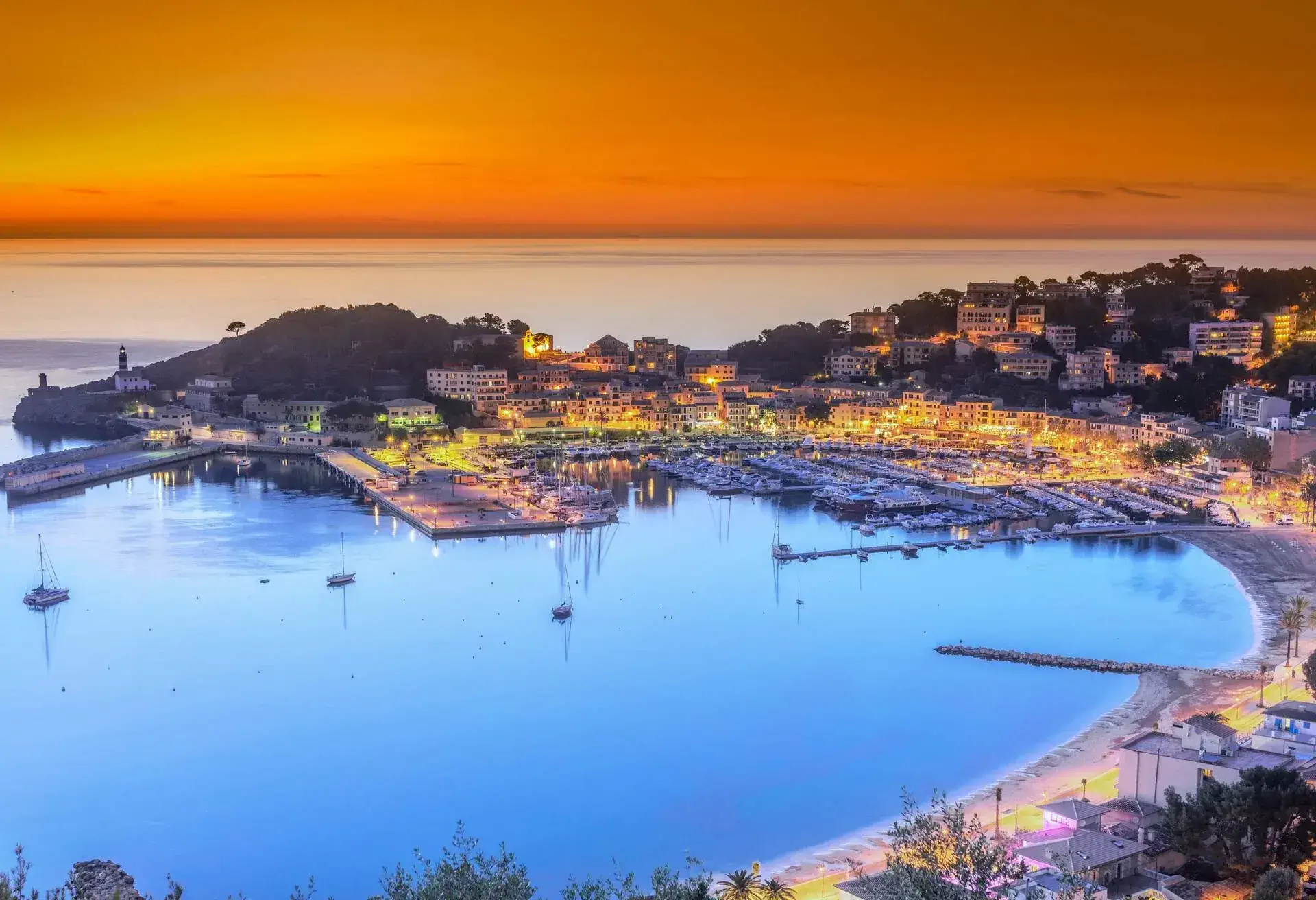 Aerial view on the harbour and town of Port de Soller on Mallorca at dusk