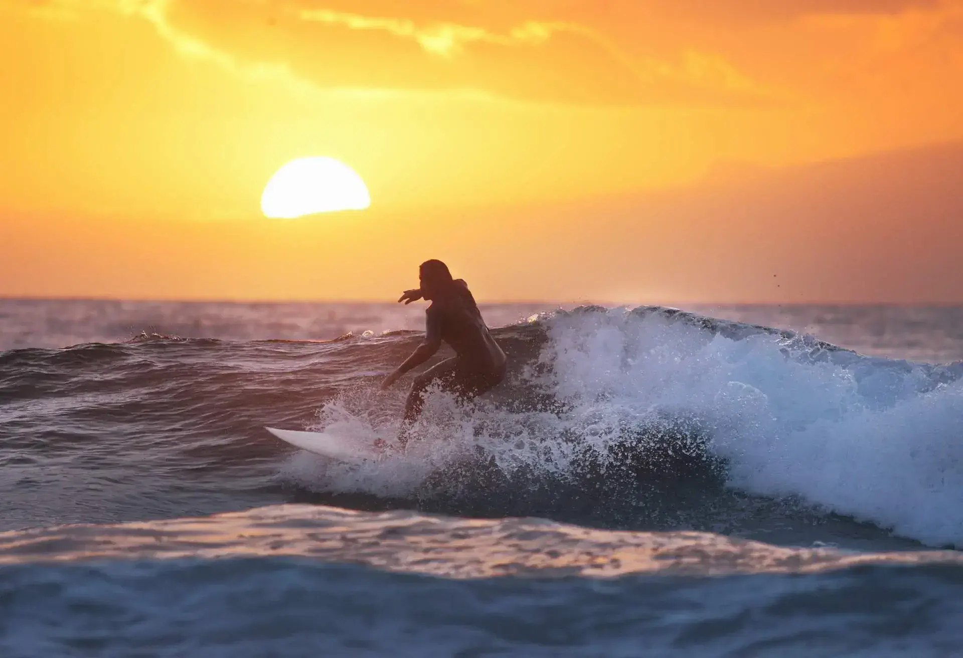 spain_canary_islands_tenerife_puerto-de-la-cruz_surfer_sunset_waves