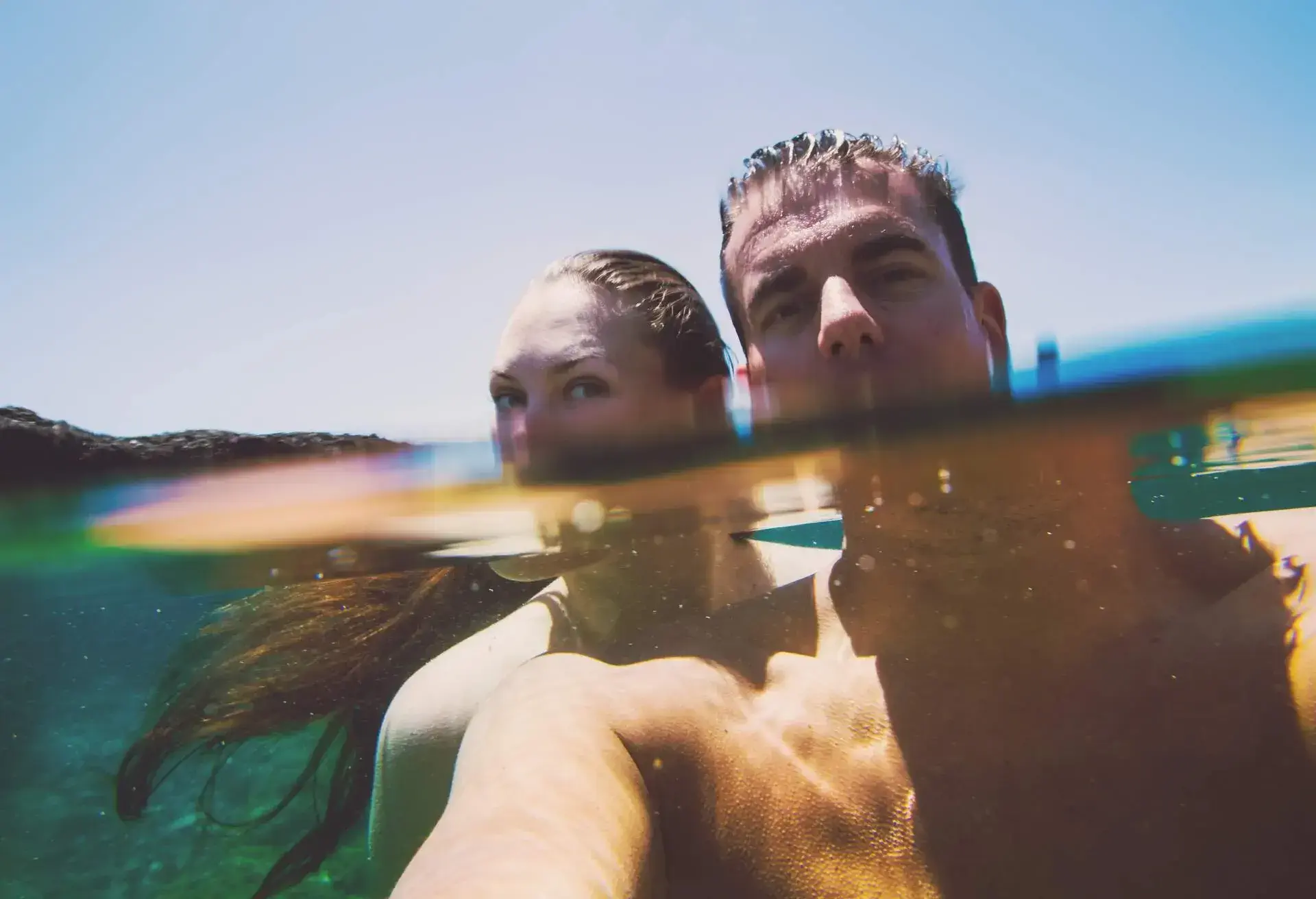 DEST_SPAIN_TENERIFE_NATURAL_POOL_PEOPLE_MAN_WOMAN_COUPLE_SWIMMING_GettyImages-681044498