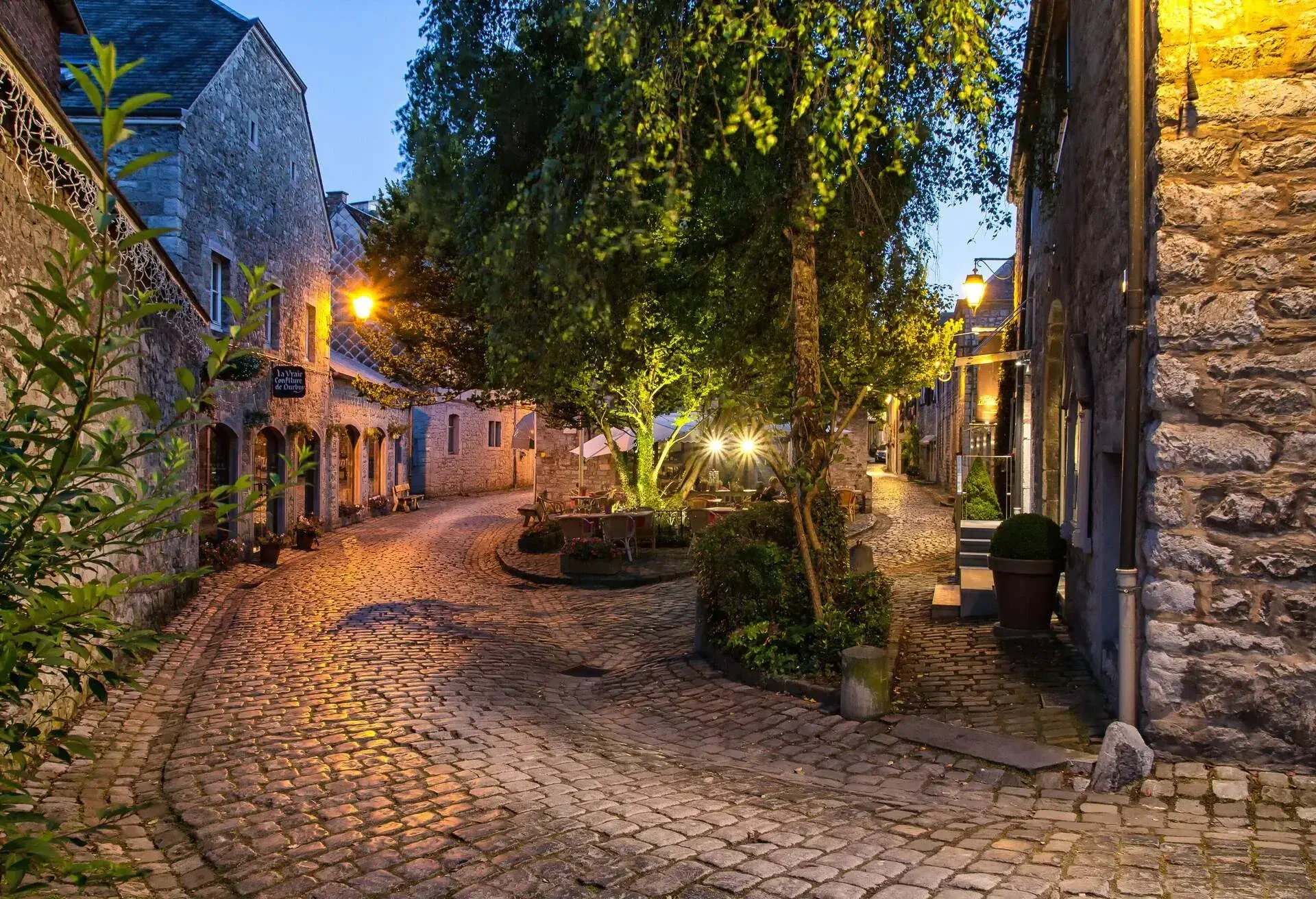 View of paved street by night in Durbuy.Known as the smallest town on earth Durbuy is also one of the prettiest.Durbuy is a Walloon city and municipality located in the Belgian province of Luxembourg.