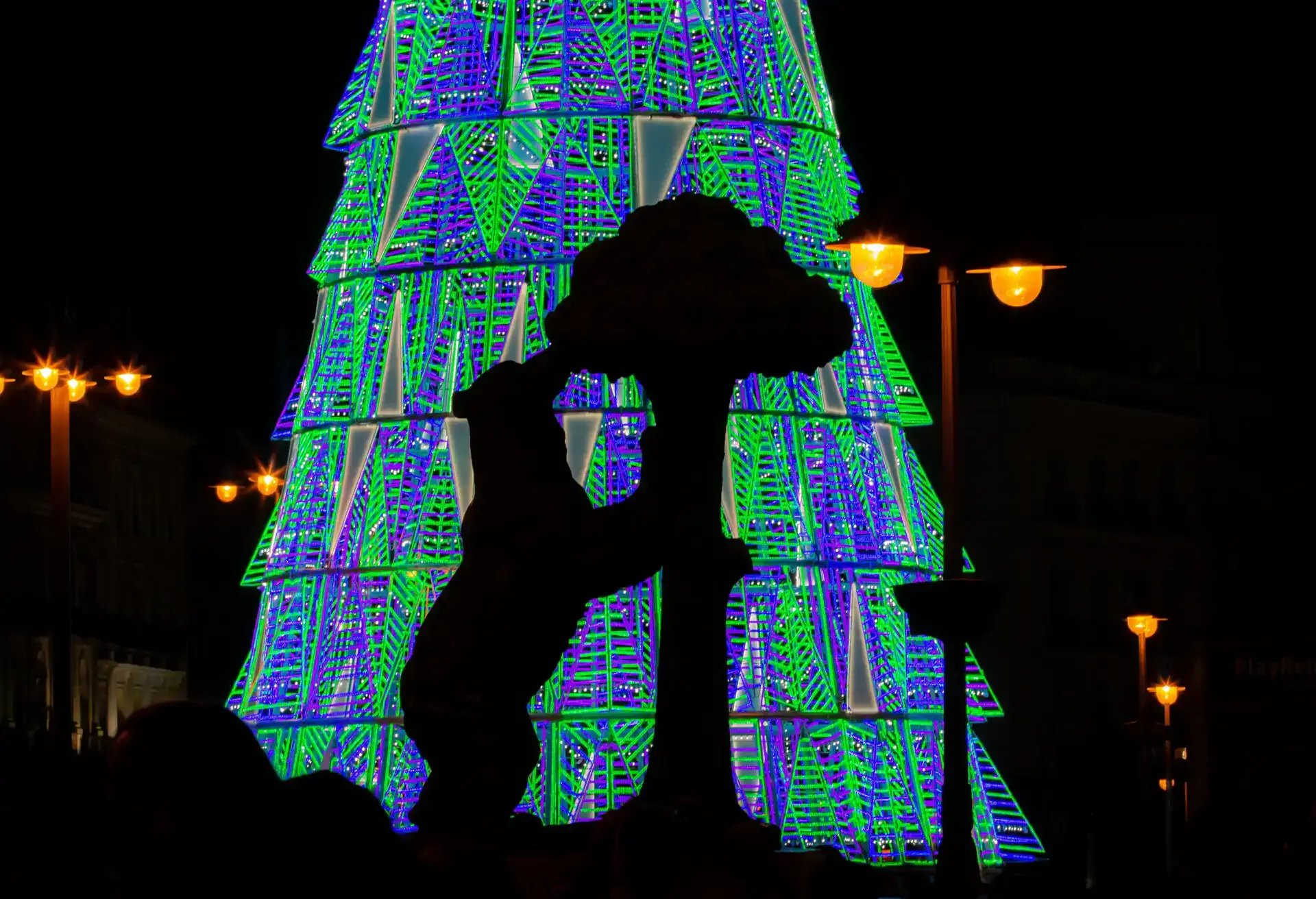 dest_spain_madrid_puerta_del_sol_christmas_tree_lights_gettyimages-1288397984_universal_within-usage-period_91812